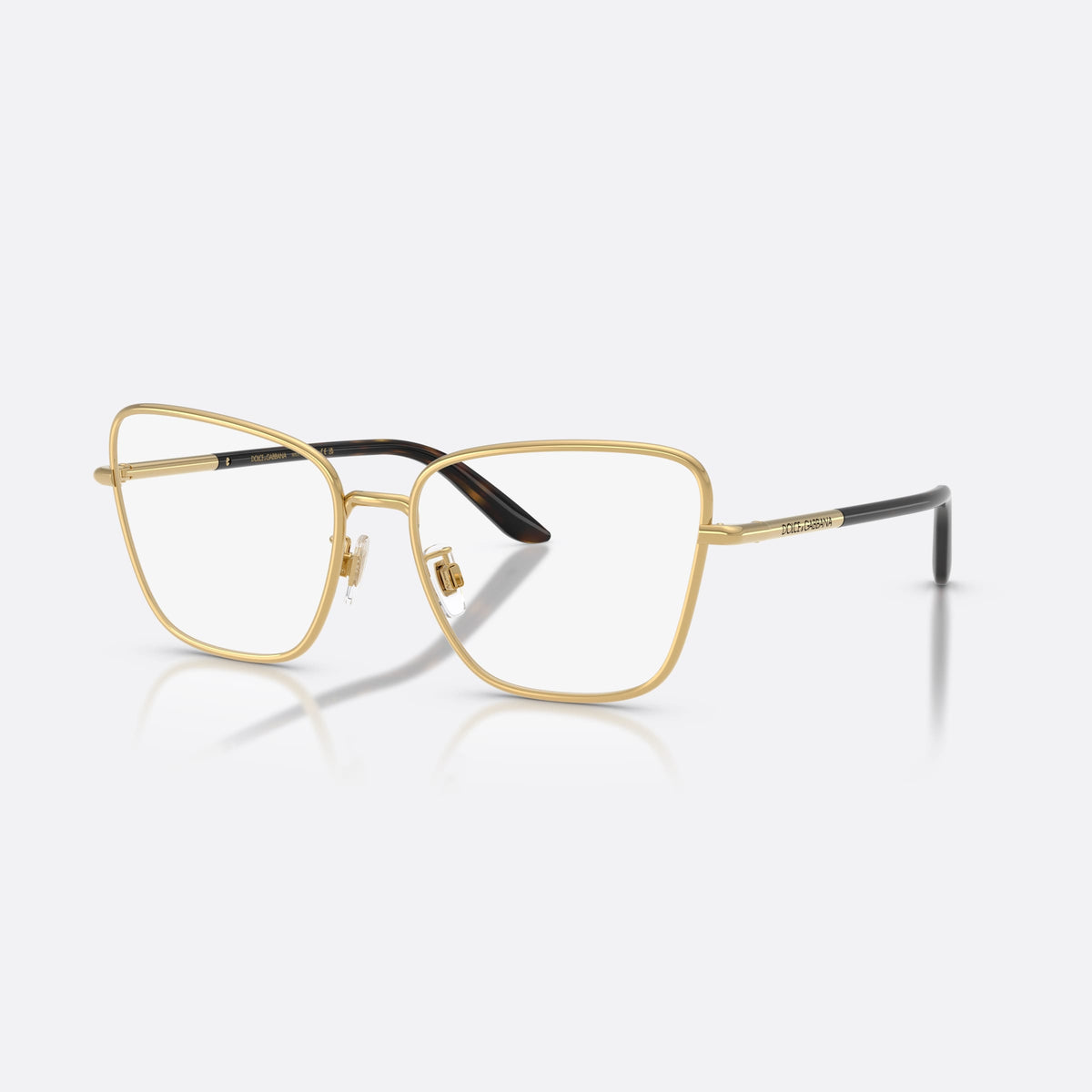 Dolce & Gabbana DG1359 02 eyeglasses, gold cat eye frame for women, plain metal bridge, brand lettering on temples