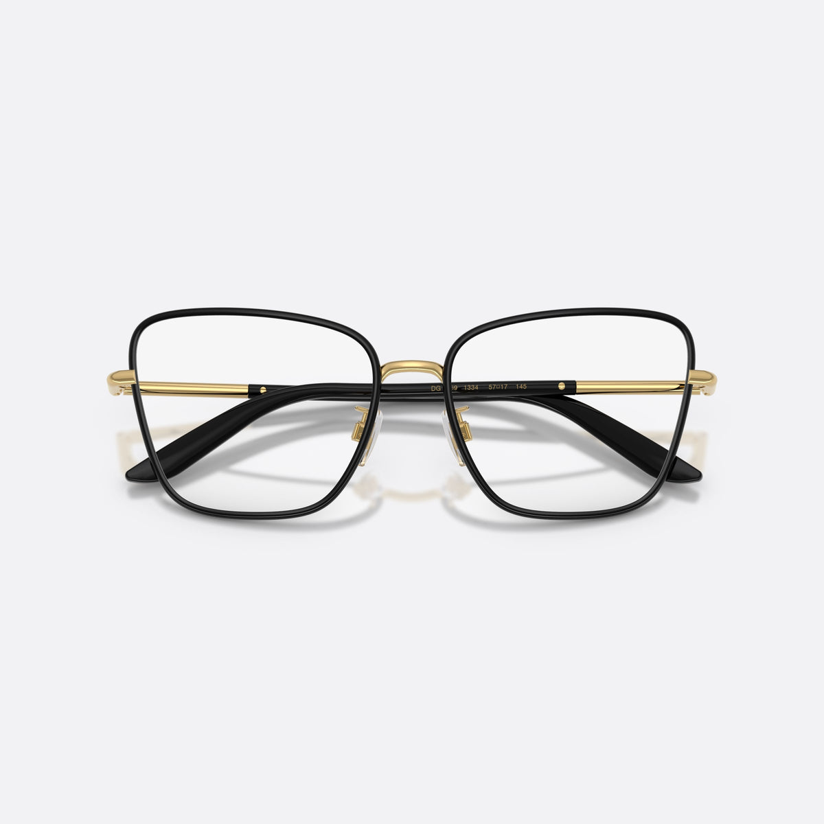 Dolce & Gabbana DG1359 1334 eyeglasses, black cat eye frame for women, metal bridge with gold accent, full-rim metal frame, folded