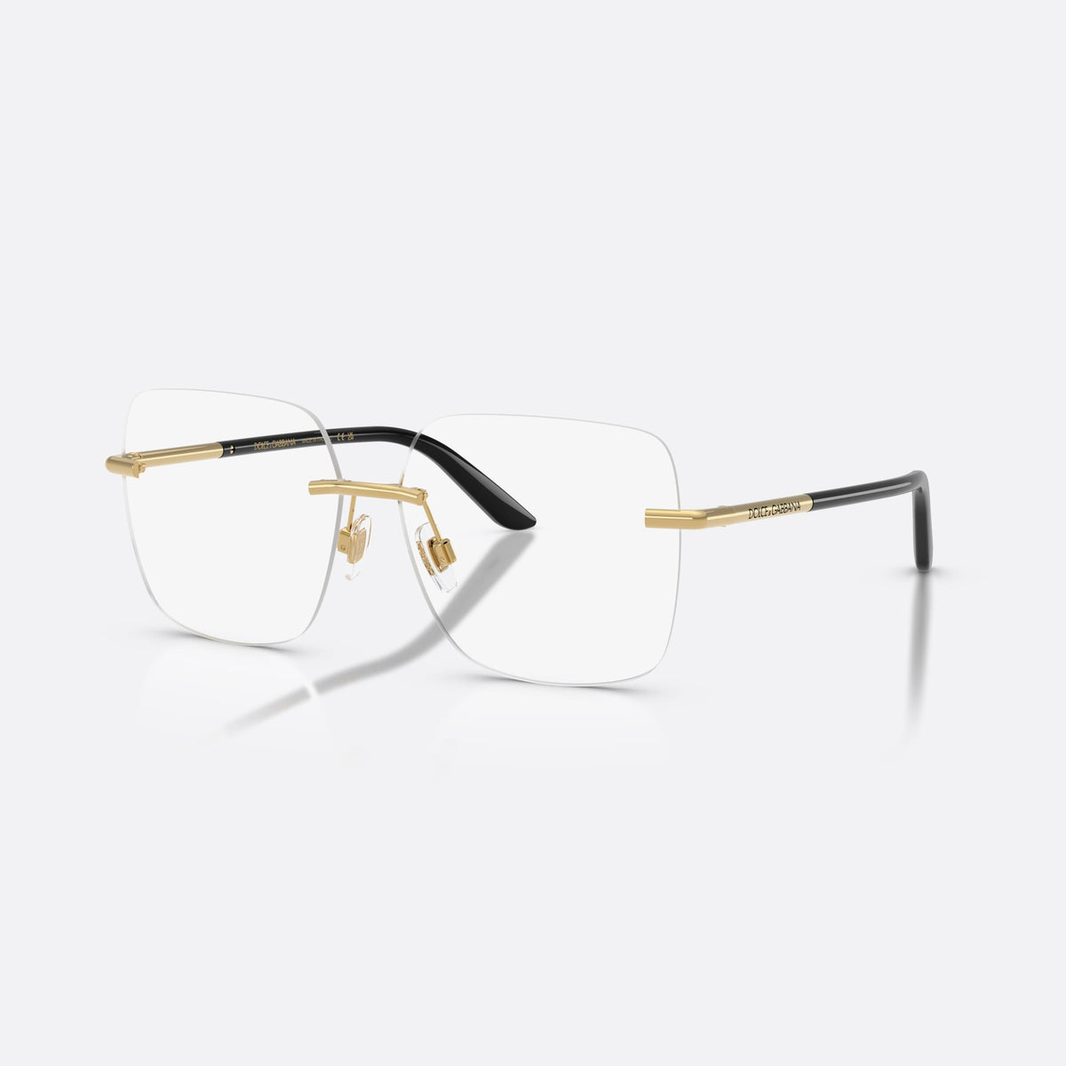 Dolce & Gabbana DG1360 02 eyeglasses, gold square frame for women, thin metal bridge bar, brand lettering on the temples