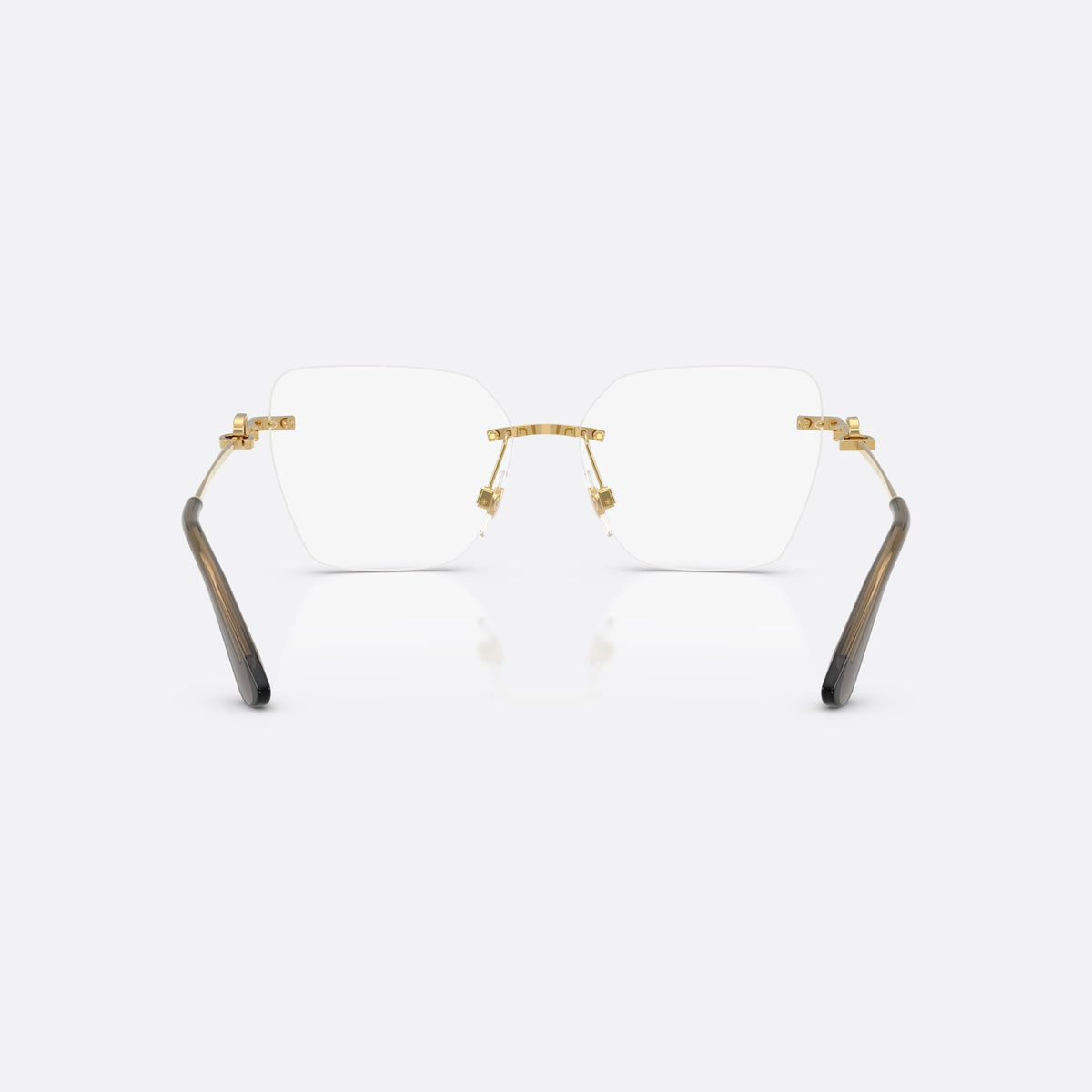 Dolce & Gabbana DG1363 02 eyeglasses, gold cat eye frame for women, metal bridge with gold-tone finish, brand logo on temples, back view