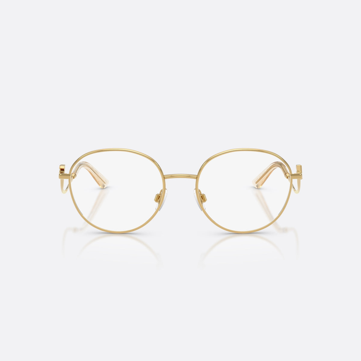 Dolce & Gabbana DG1365 02 eyeglasses, gold round frame for women, plain metal bridge, brand logo plaque on temples, front view