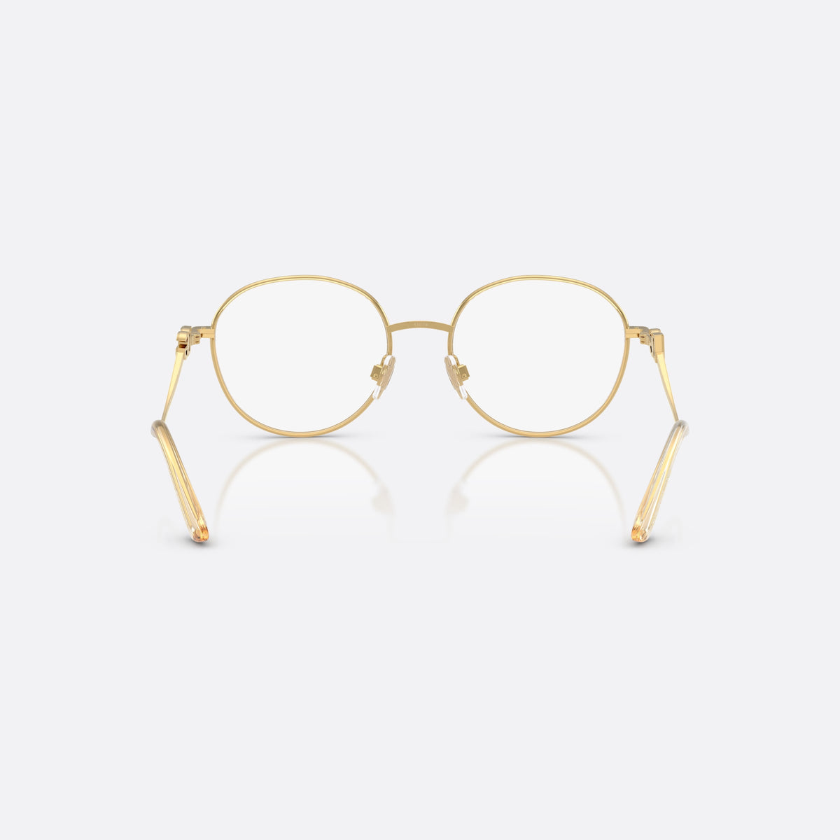 Dolce & Gabbana DG1365 02 eyeglasses, gold round frame for women, plain metal bridge, brand logo plaque on temples, back view