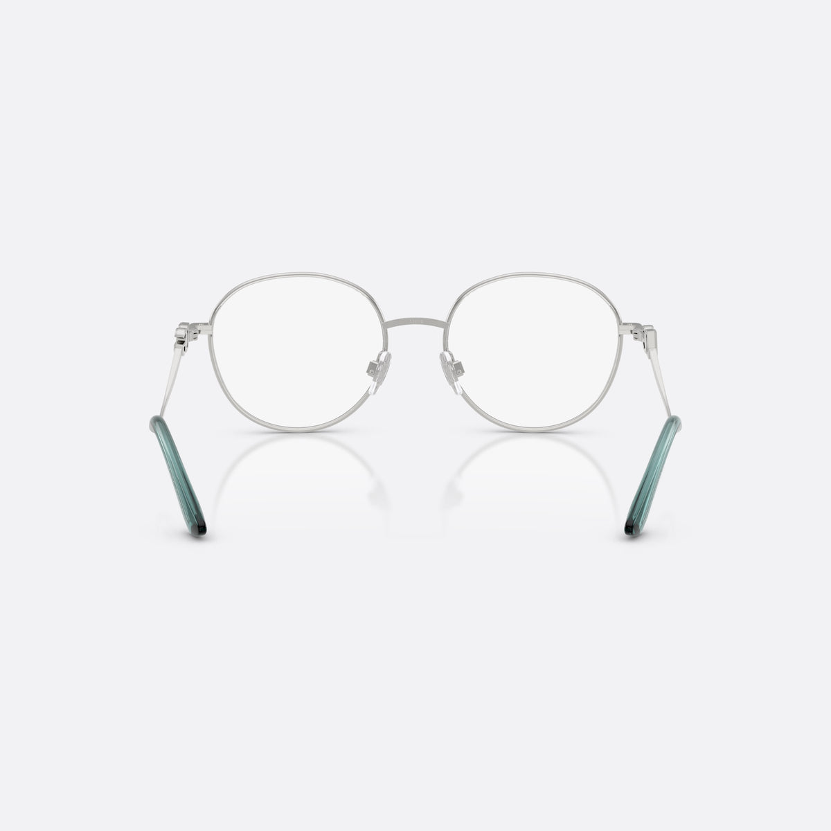 Dolce & Gabbana DG1365 1325 eyeglasses, silver round frame for women, thin metal bridge, brand logo plaque on temples, back view