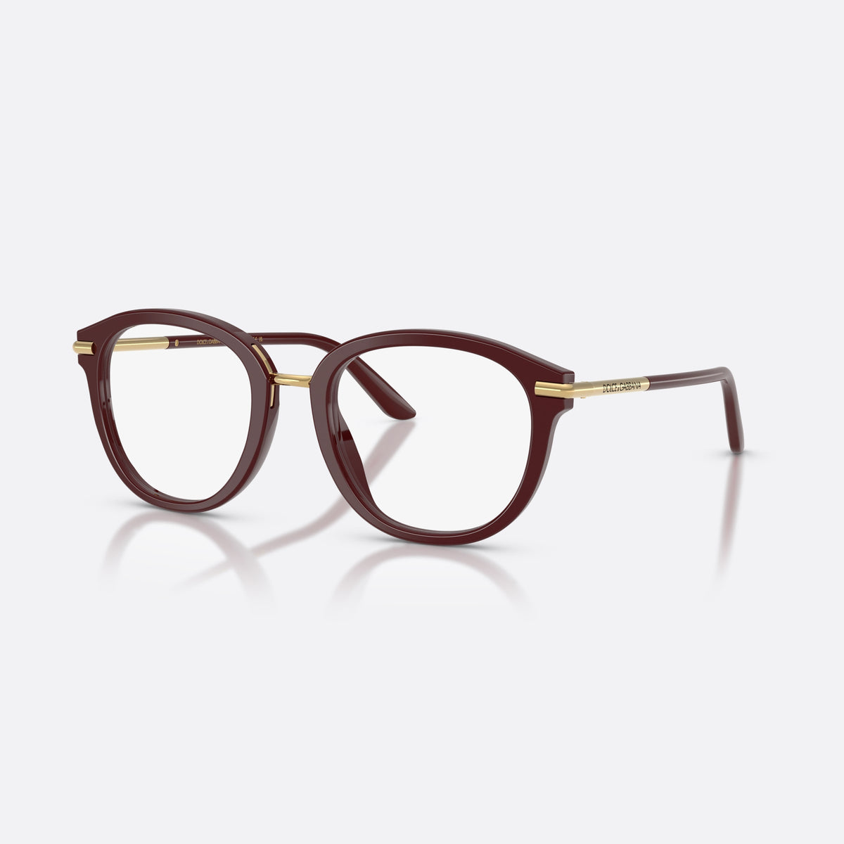 Dolce & Gabbana DG3410 3091 eyeglasses, red phantos frame for women, metal saddle bridge, brand lettering on temples