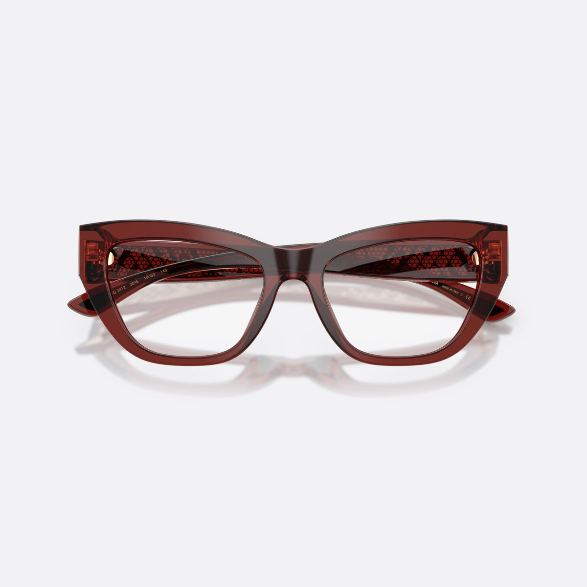 Dolce & Gabbana DG3412 3045 eyeglasses, red cat eye frame for women, plain bridge, wide temples with decorative pattern, folded