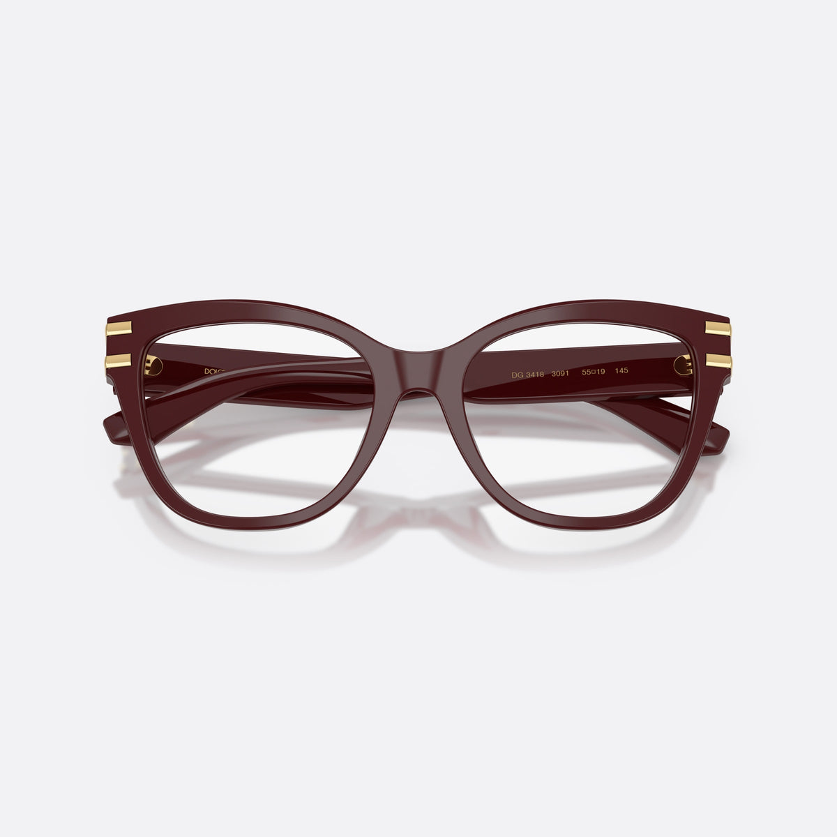 Dolce & Gabbana DG3418 3091 eyeglasses, red butterfly frame for women, plain double bridge, brand logo on temples, folded