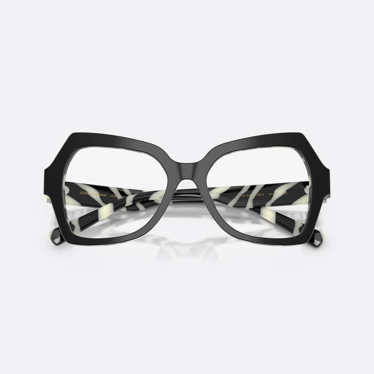 Dolce & Gabbana DG3429 3372 eyeglasses, black butterfly frame for women, plain acetate bridge, brand logo plaque on temple, folded