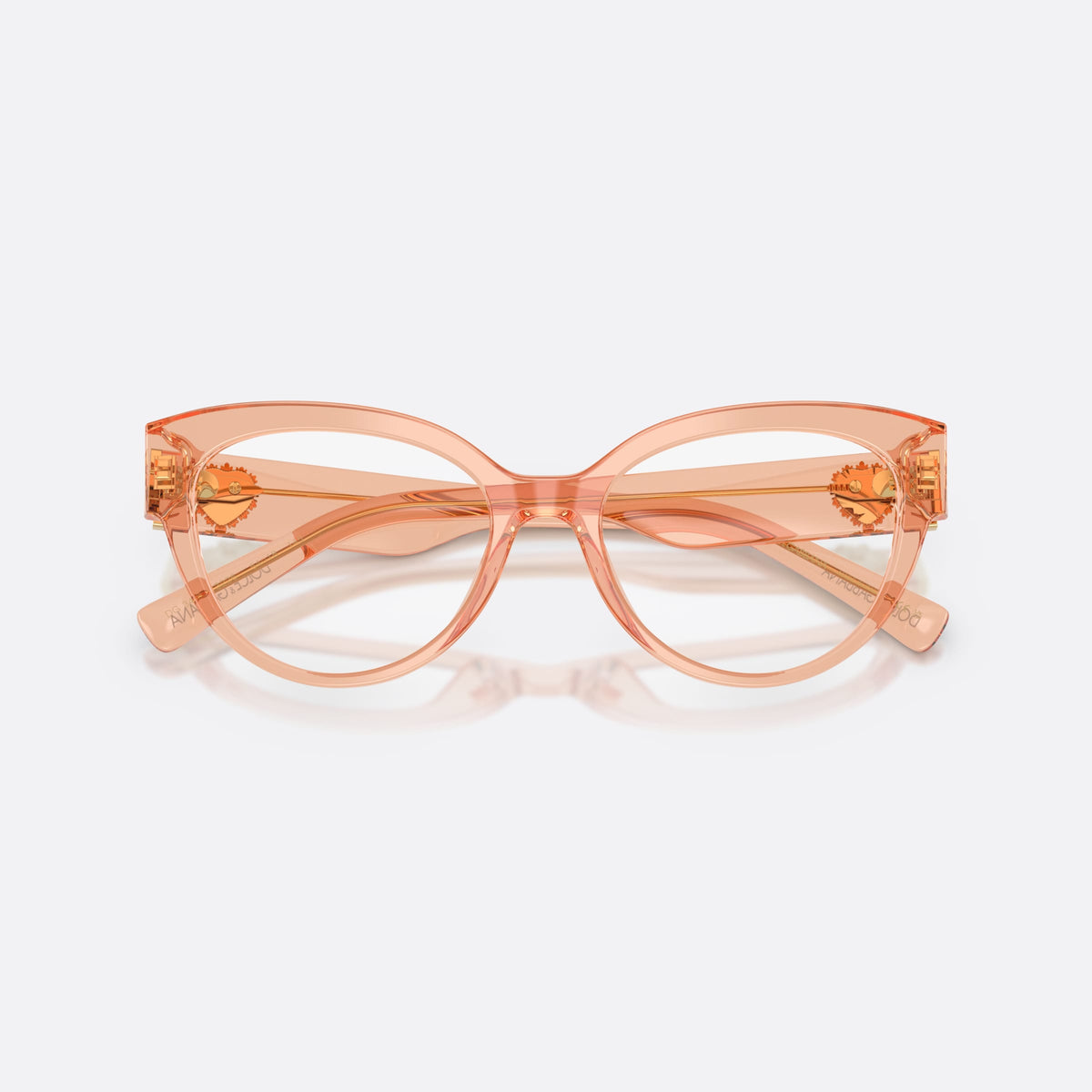 Dolce & Gabbana DG3440 3226 eyeglasses, pink cat eye frame for women, plain integrated bridge, gold-tone medallion on temples, folded