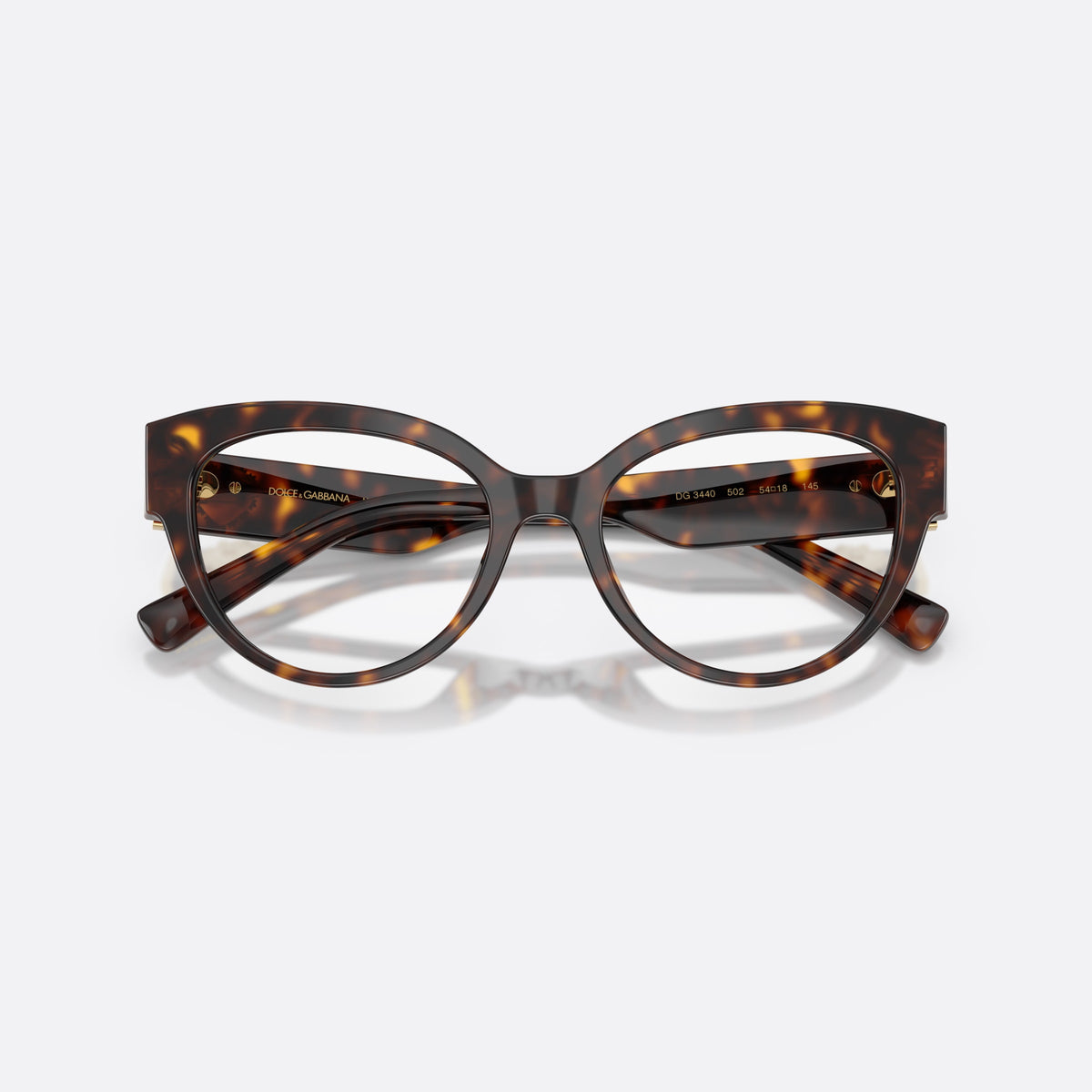 Dolce & Gabbana DG3440 502 eyeglasses, havana cat eye frame for women, plain bridge, brand logo plaque on temples, folded