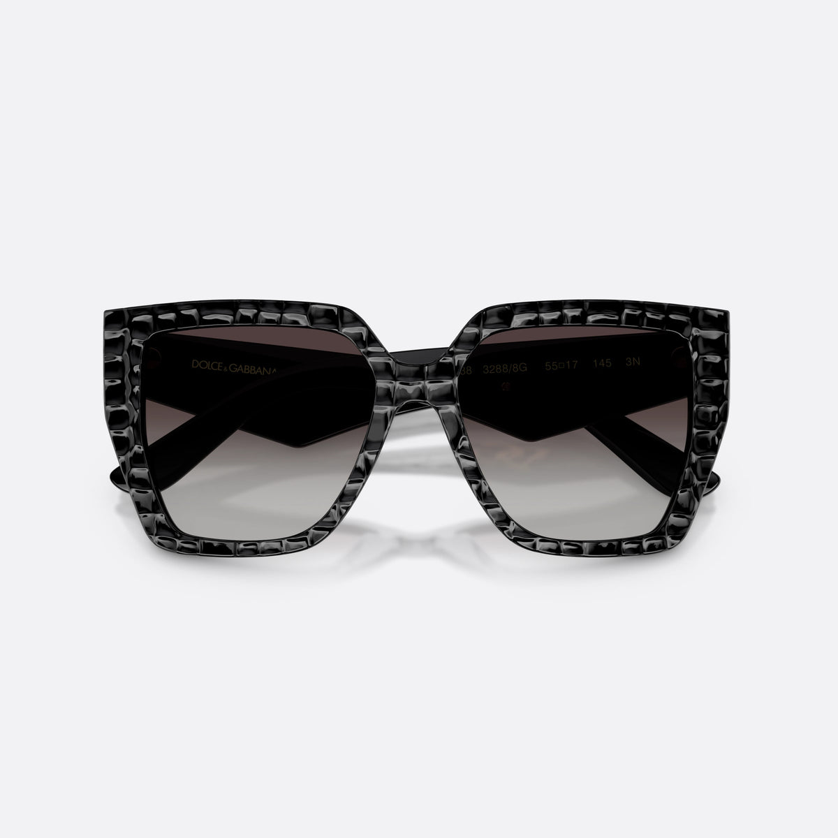 Dolce & Gabbana DG4438 32888G sunglasses, black square frame for women, keyhole bridge, brand logo plaque on temple, folded