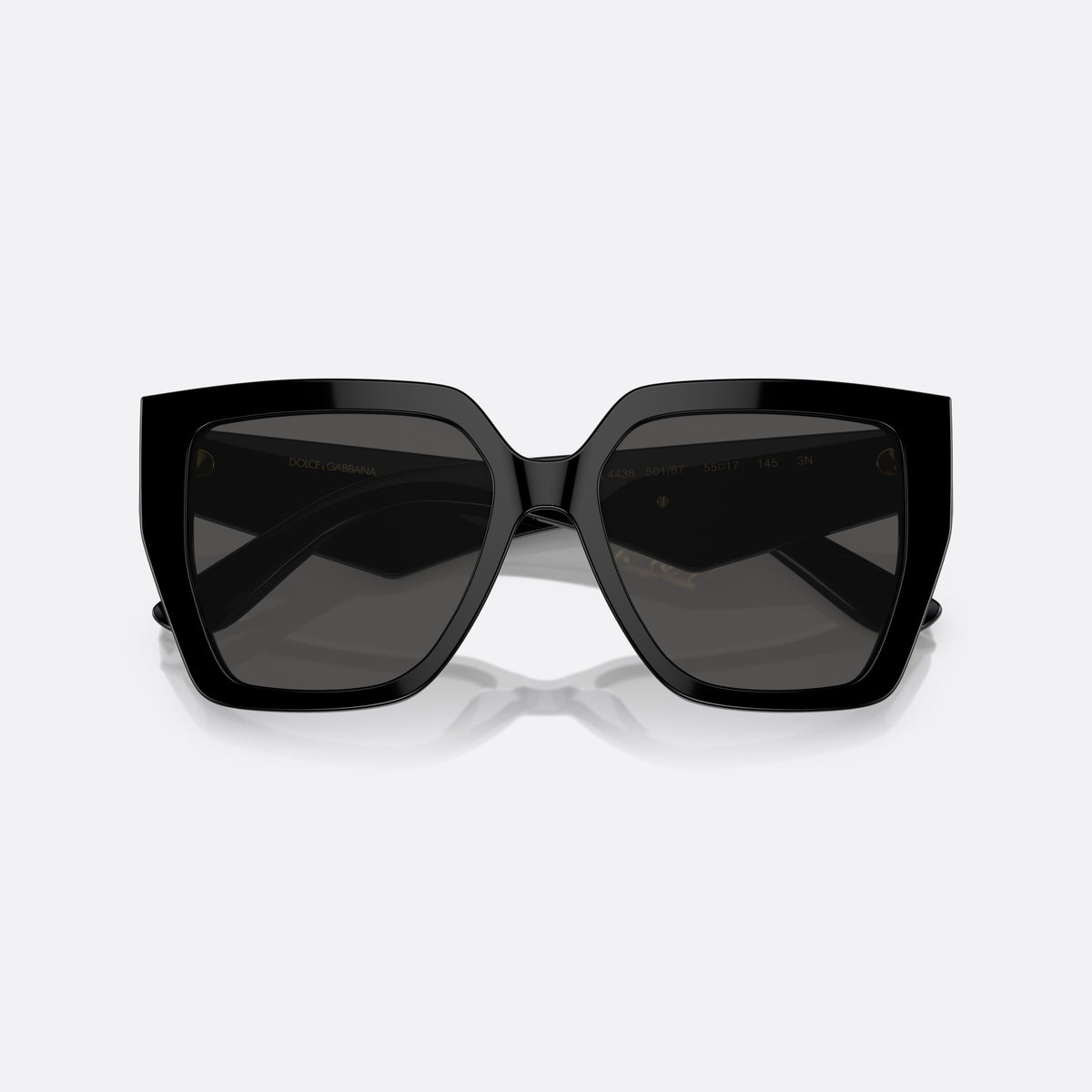 Dolce & Gabbana DG4438 501/87 sunglasses, black square frame for women, plain double bridge, brand logo on temples, folded