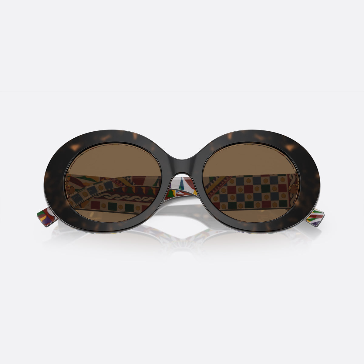 Dolce & Gabbana DG4448 3217/73 A sunglasses, havana oval frame for women, plain acetate bridge, brand logo plaque on temple, folded