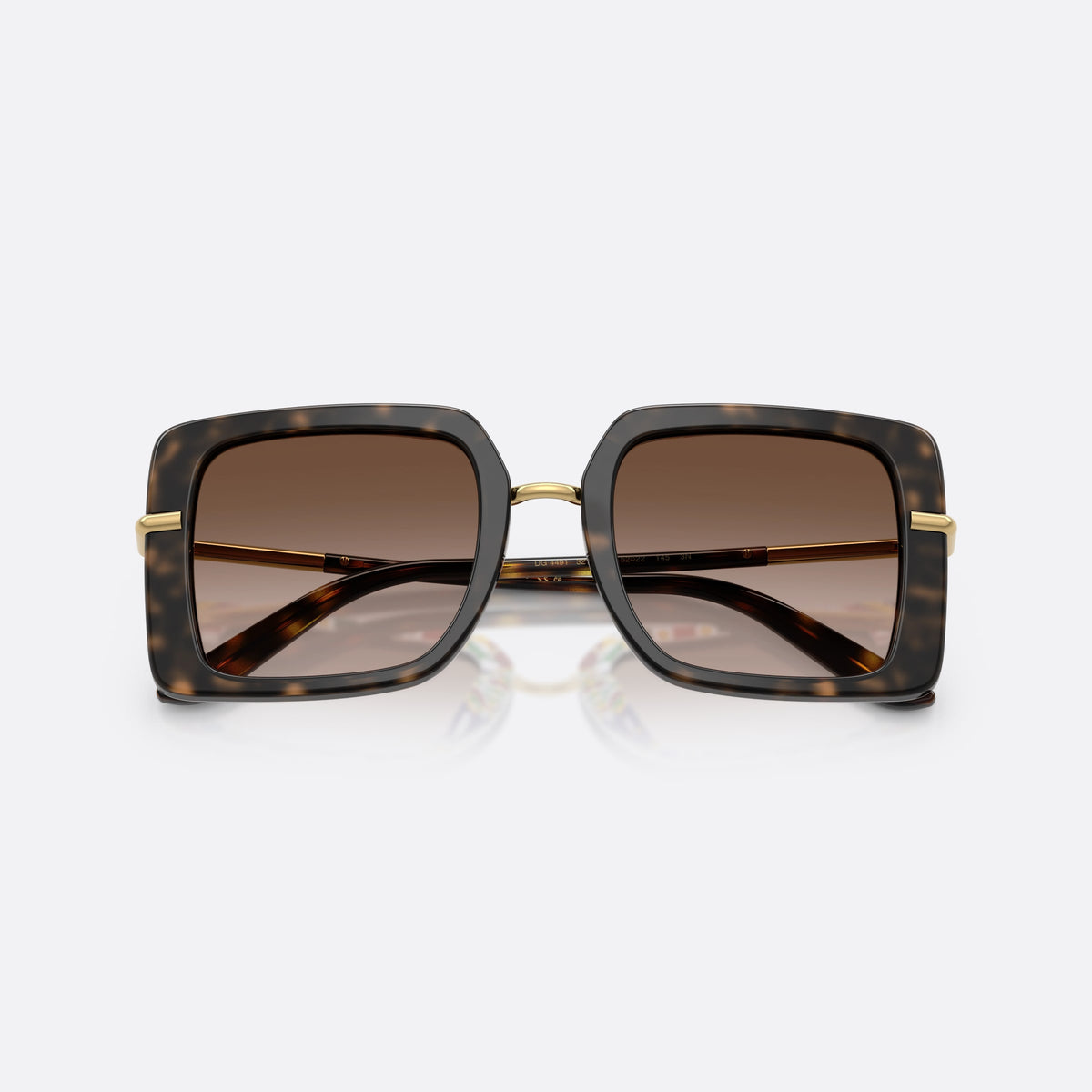 Dolce & Gabbana DG4491 321713 sunglasses, havana square frame for women, metal saddle bridge, brand lettering on temples, folded