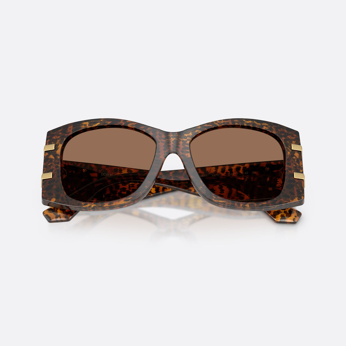 Dolce & Gabbana DG4501 347073 sunglasses, brown butterfly frame for women, plain integrated bridge, brand logo plaque on temple, folded