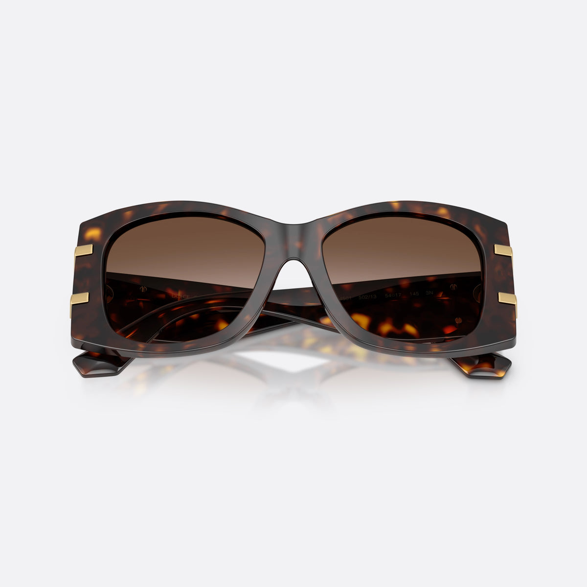 Dolce & Gabbana DG4501 502/13 sunglasses, havana butterfly frame for women, plain bridge with central dip, wide temples with plaque, folded