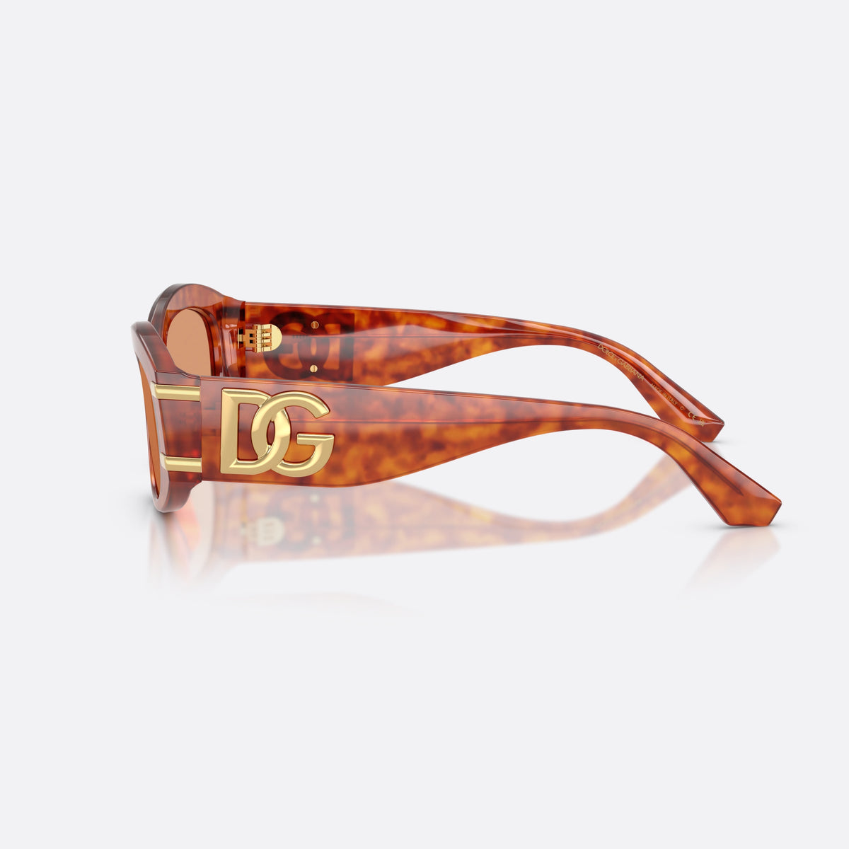 Dolce & Gabbana DG4502 3452/7 sunglasses, brown oval frame for women, plain integrated bridge, brand logo plaque on temple, side view