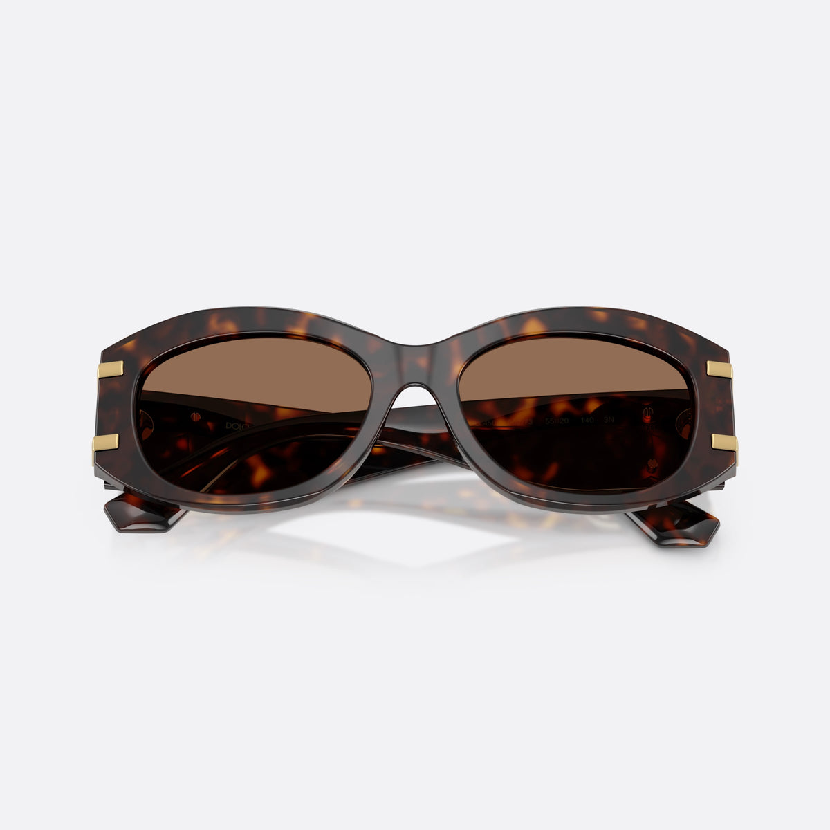 Dolce & Gabbana DG4502 502/73 sunglasses, havana oval frame for women, keyhole bridge, brand logo on temples, full-rim frame, folded