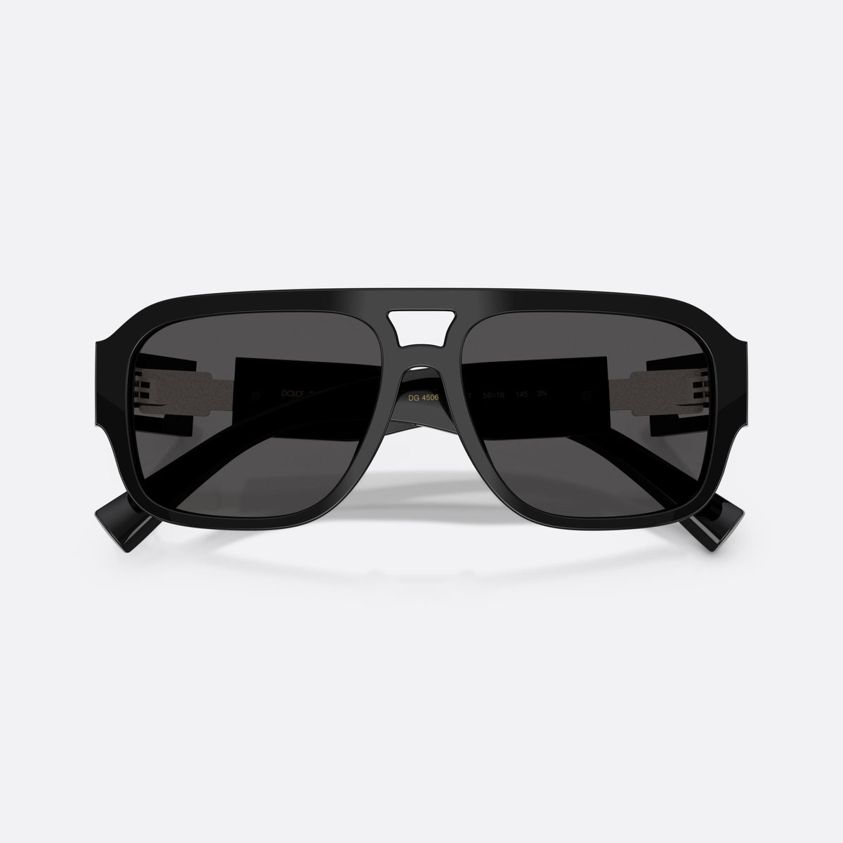 Dolce & Gabbana DG4506 501/87 sunglasses, black pilot frame for men, double bridge with open window, wide tapered temples, folded