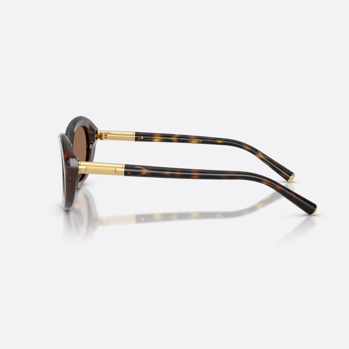 Dolce & Gabbana DG4519 502/73 sunglasses, havana oval frame for women, plain bridge, brand lettering on temple, full rim frame, side view
