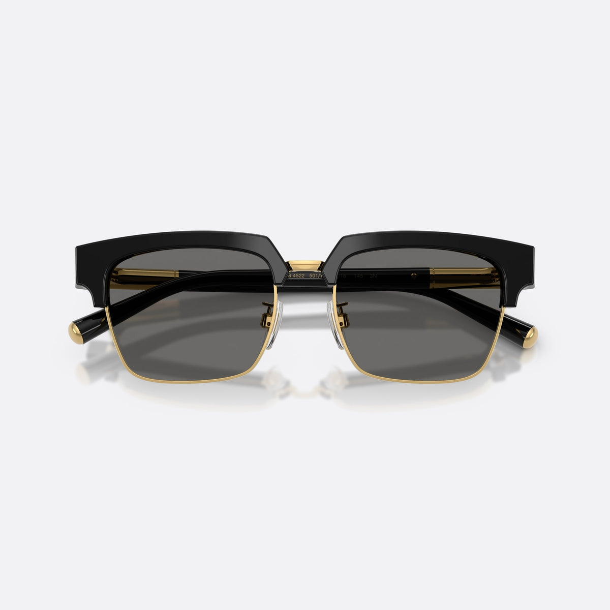 Dolce & Gabbana DG4522 501/1 sunglasses, black square frame for men, double metal bridge with gold-tone center, folded