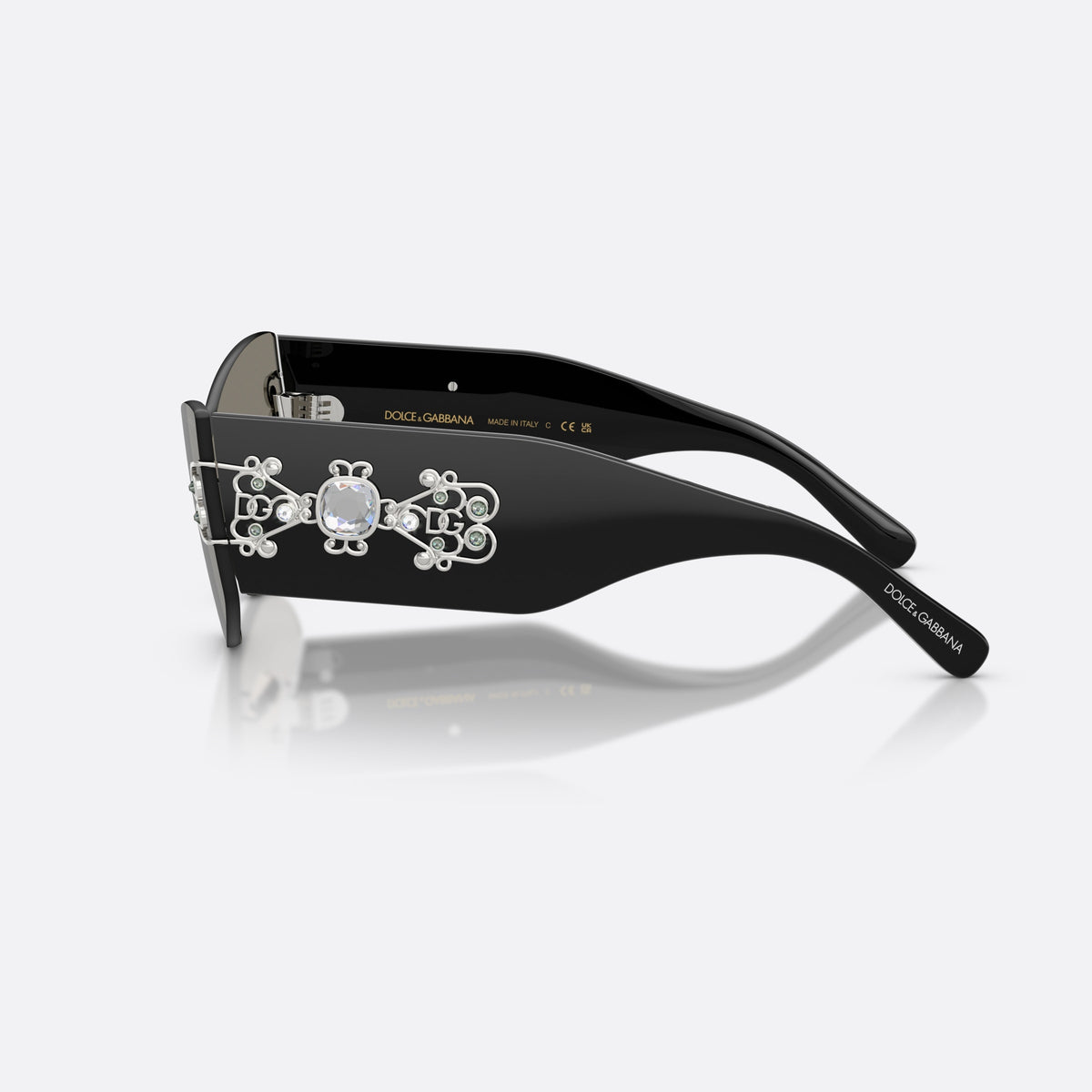 Dolce & Gabbana DG4526B 501/6G sunglasses, black cat eye frame for women, brand lettering on temples, wide black temples, side view