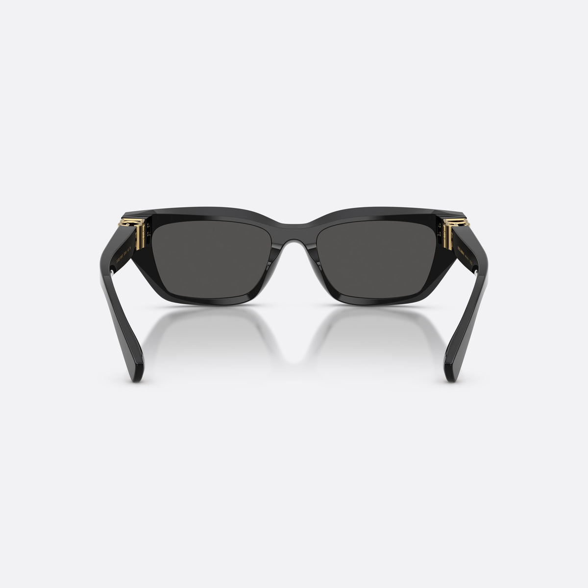 Dolce & Gabbana DG4532 501/87 sunglasses, black cat eye frame for women, plain double bridge, brand lettering on temples, back view