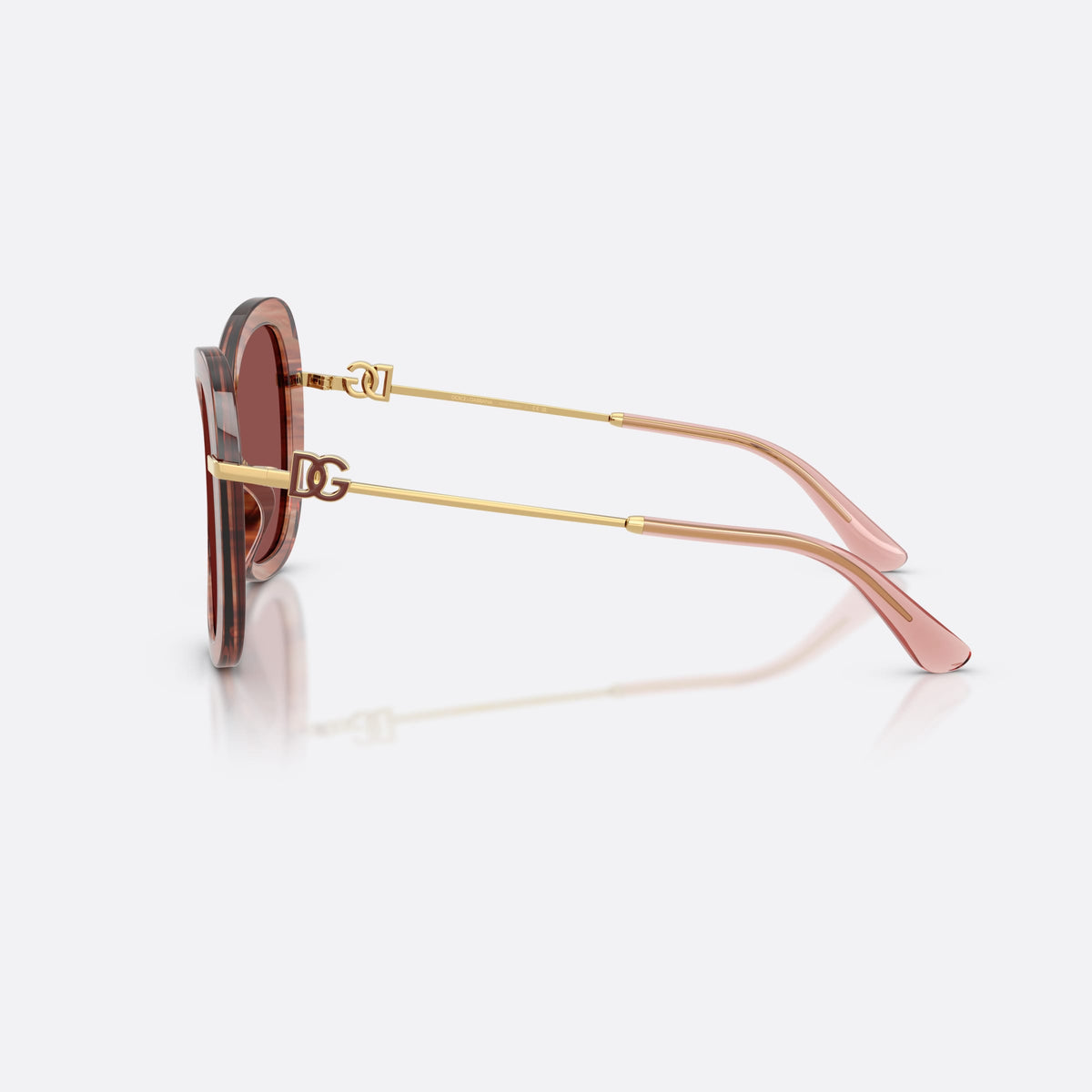 Dolce & Gabbana DG4535 347375 sunglasses, red butterfly frame for women, thin gold-tone metal bridge, slim tapered temples, side view
