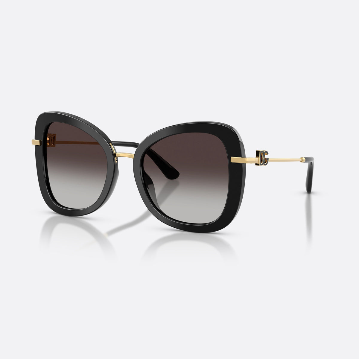 Dolce & Gabbana DG4535 501/8G sunglasses, black butterfly frame for women, metal bridge with gold-tone finish, gradient tinted lenses