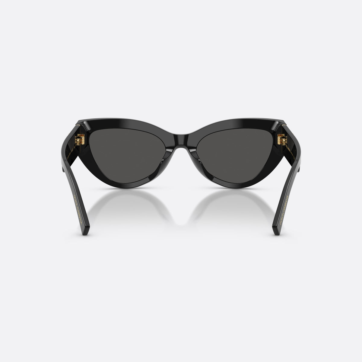 Dolce & Gabbana DG4536 501/87 sunglasses, black cat eye frame for women, plain bridge, brand lettering on temples, wide temples, back view