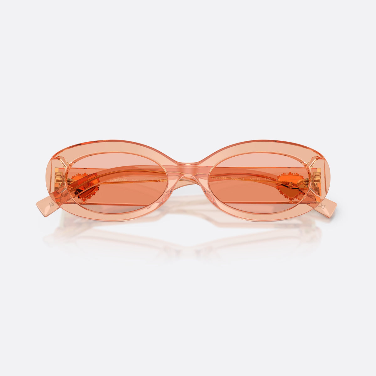 Dolce & Gabbana DG4537 322684 sunglasses, pink oval frame for women, plain bridge, brand logo plaque on temples, full-rim frame, folded