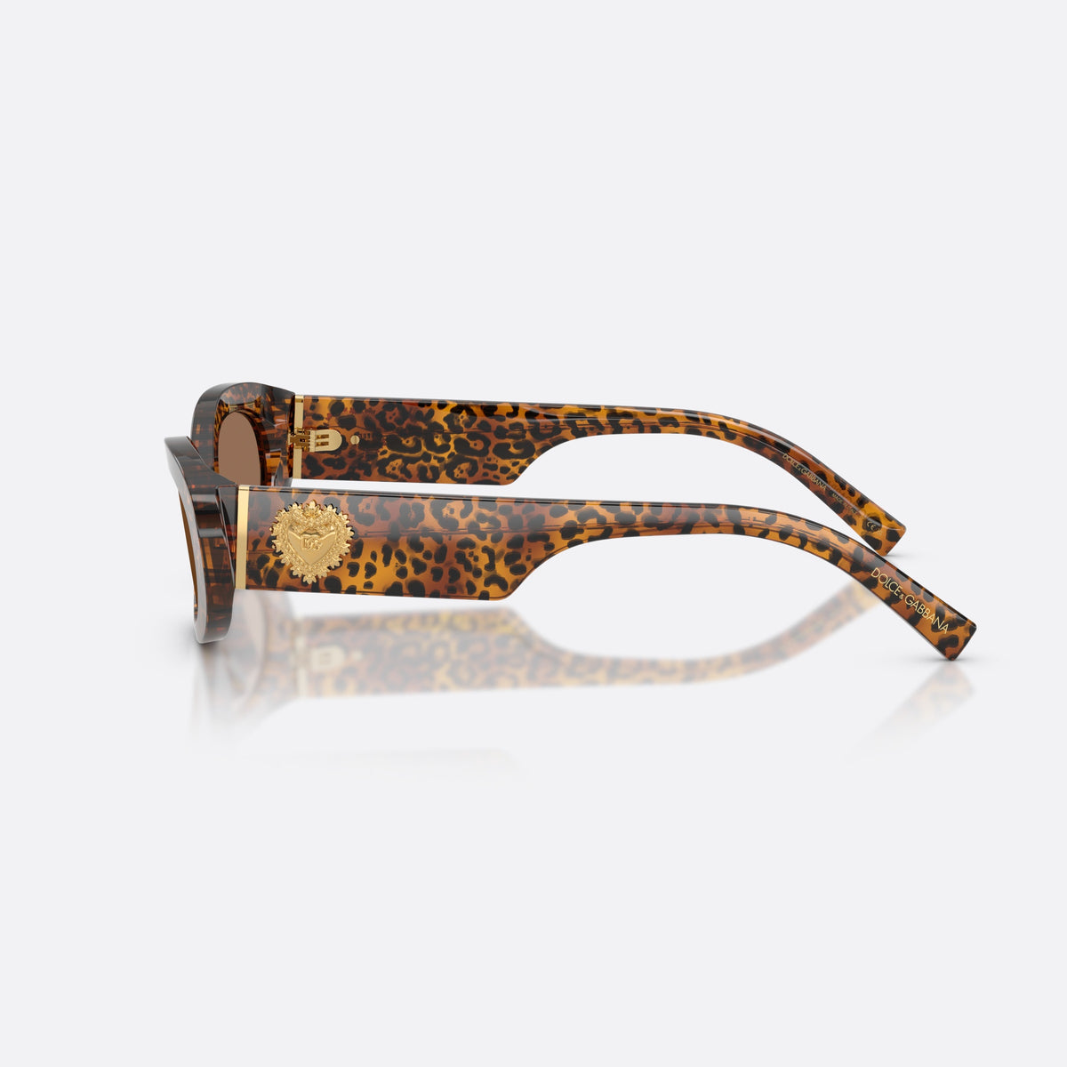 Dolce & Gabbana DG4537 347073 sunglasses, brown oval frame for women, plain bridge, brand logo on plaque, wide tapered temples, side view