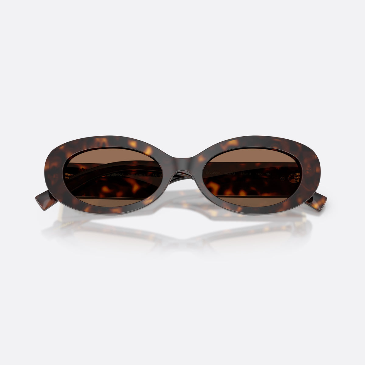 Dolce & Gabbana DG4537 502/73 sunglasses, havana oval frame for women, plain bridge, brand logo on temple, full-rim frame, folded
