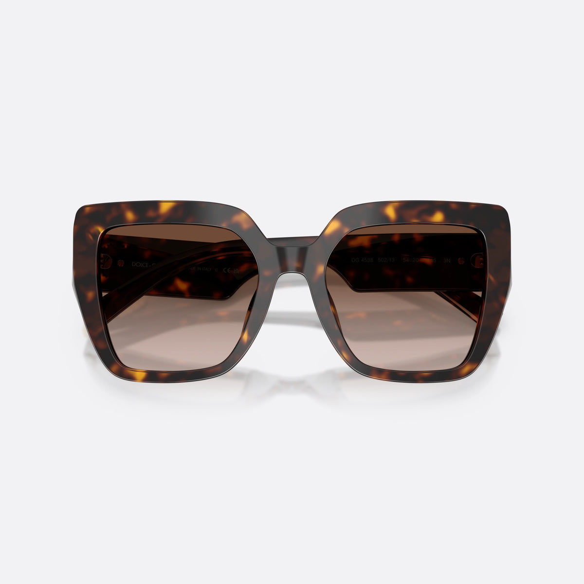 Dolce & Gabbana DG4538 502/13 sunglasses, havana square frame for women, double bridge with central cutout, brand lettering on temple, folded