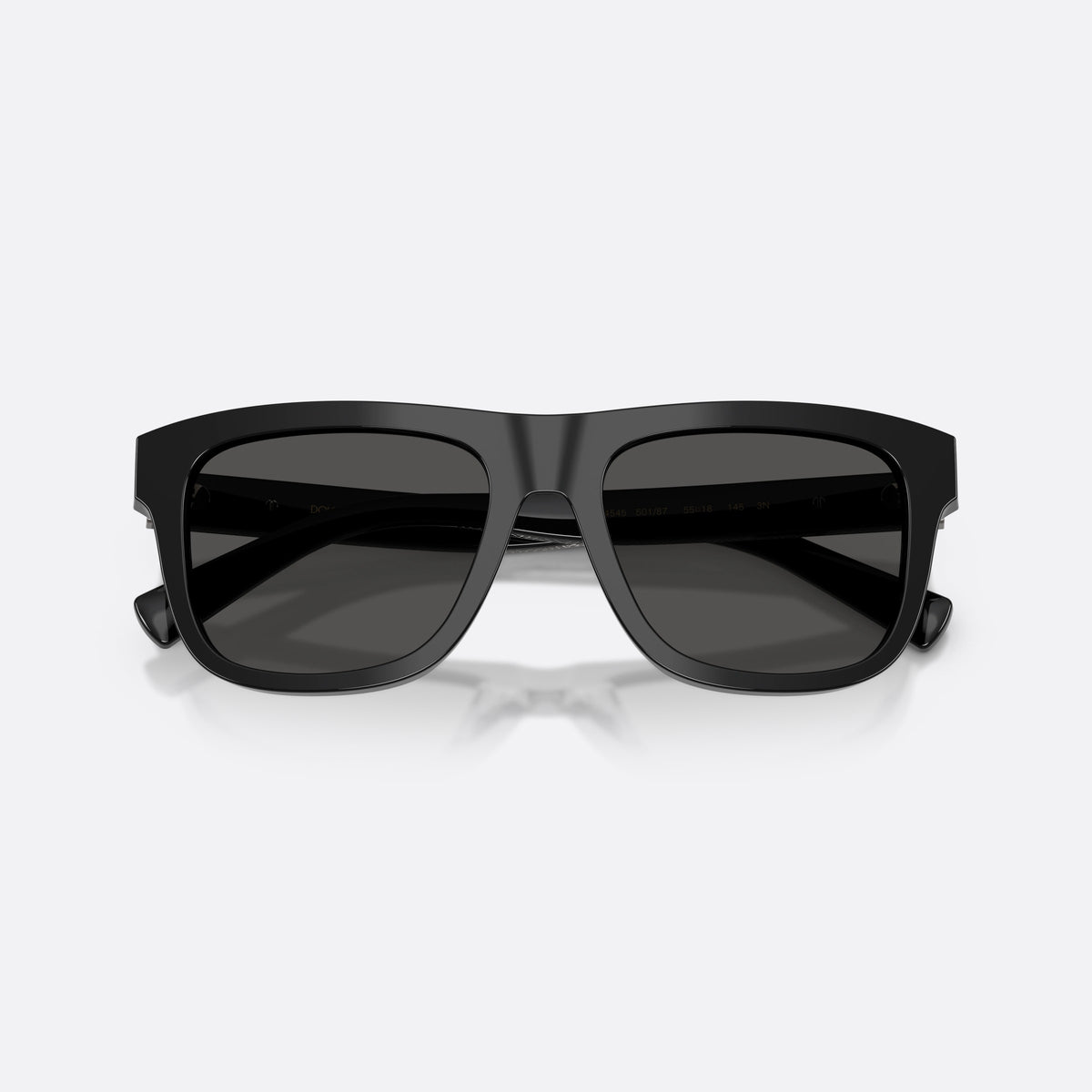 Dolce & Gabbana DG4545 501/87 sunglasses, black square frame for men, plain bridge, brand lettering on temple, full-rim frame, folded