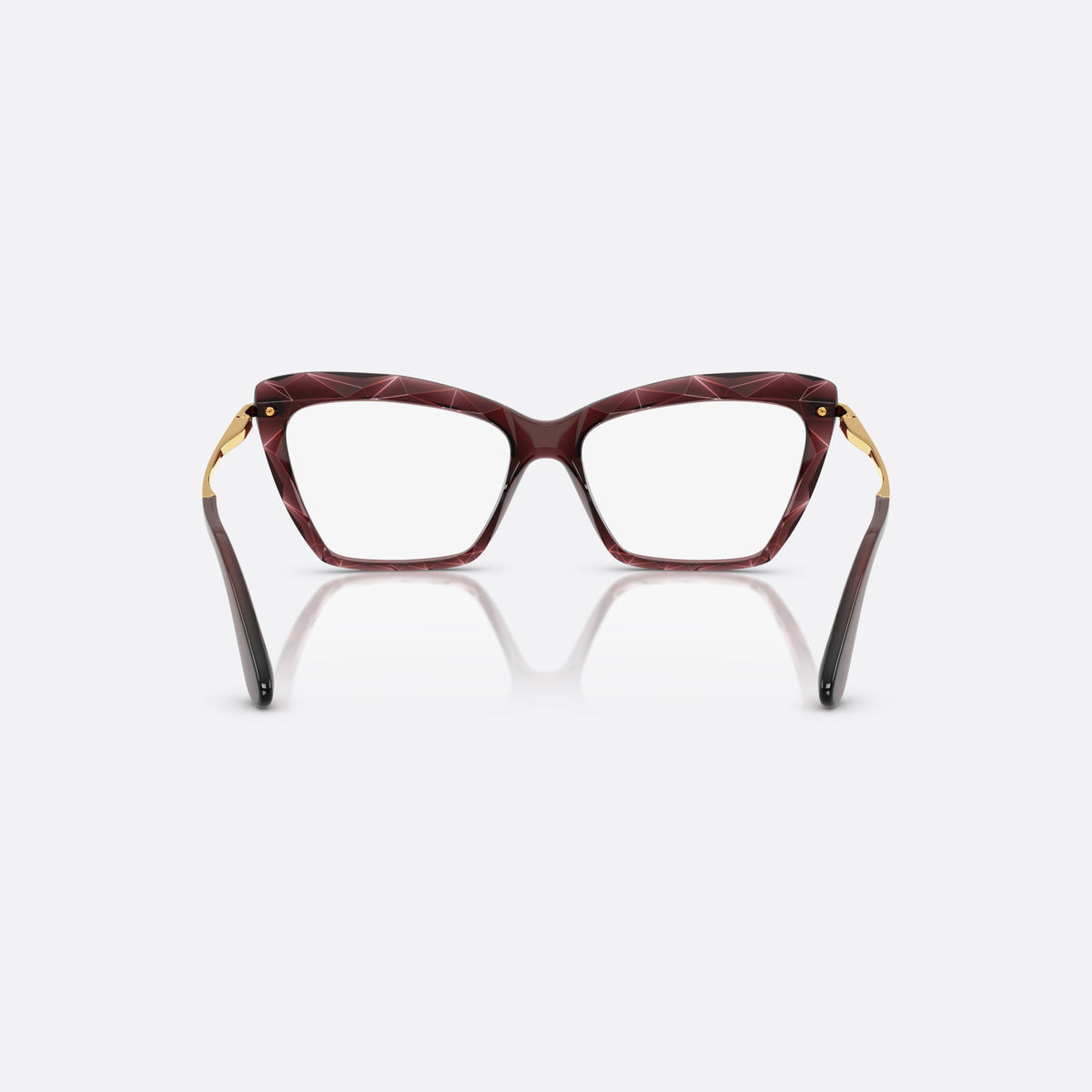 Dolce & Gabbana DG5025 3045 eyeglasses, red cat eye frame for women, plain double-arch bridge, brand lettering on temples, back view