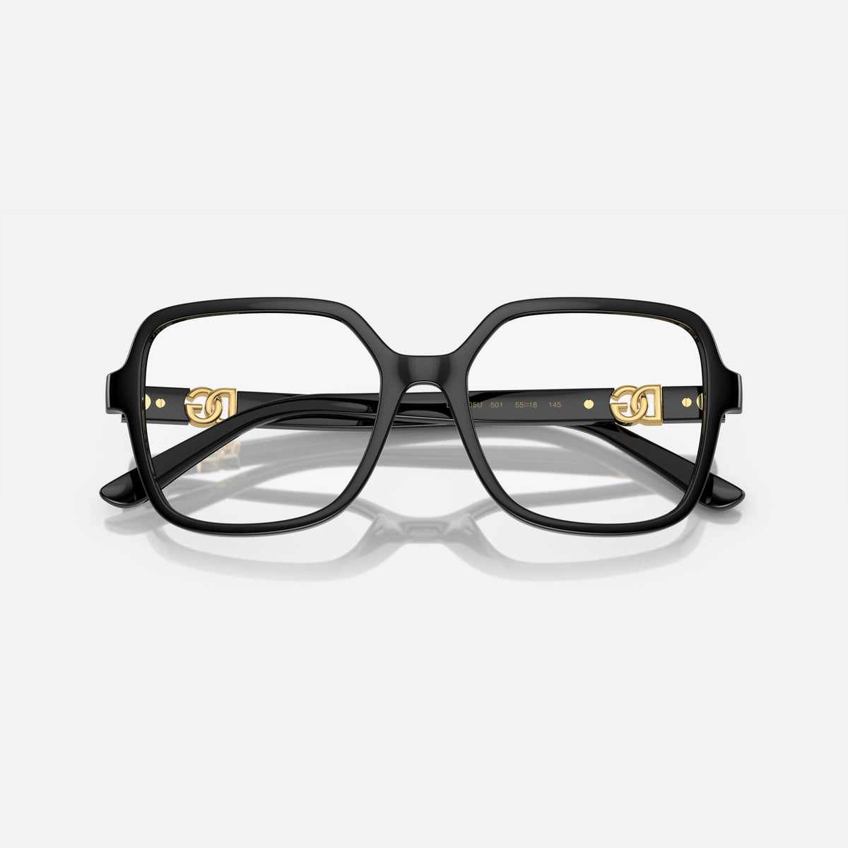Dolce & Gabbana DG5105U 501 A eyeglasses, black oversize frame for women, plain integrated bridge, brand logo plaque on temples, folded