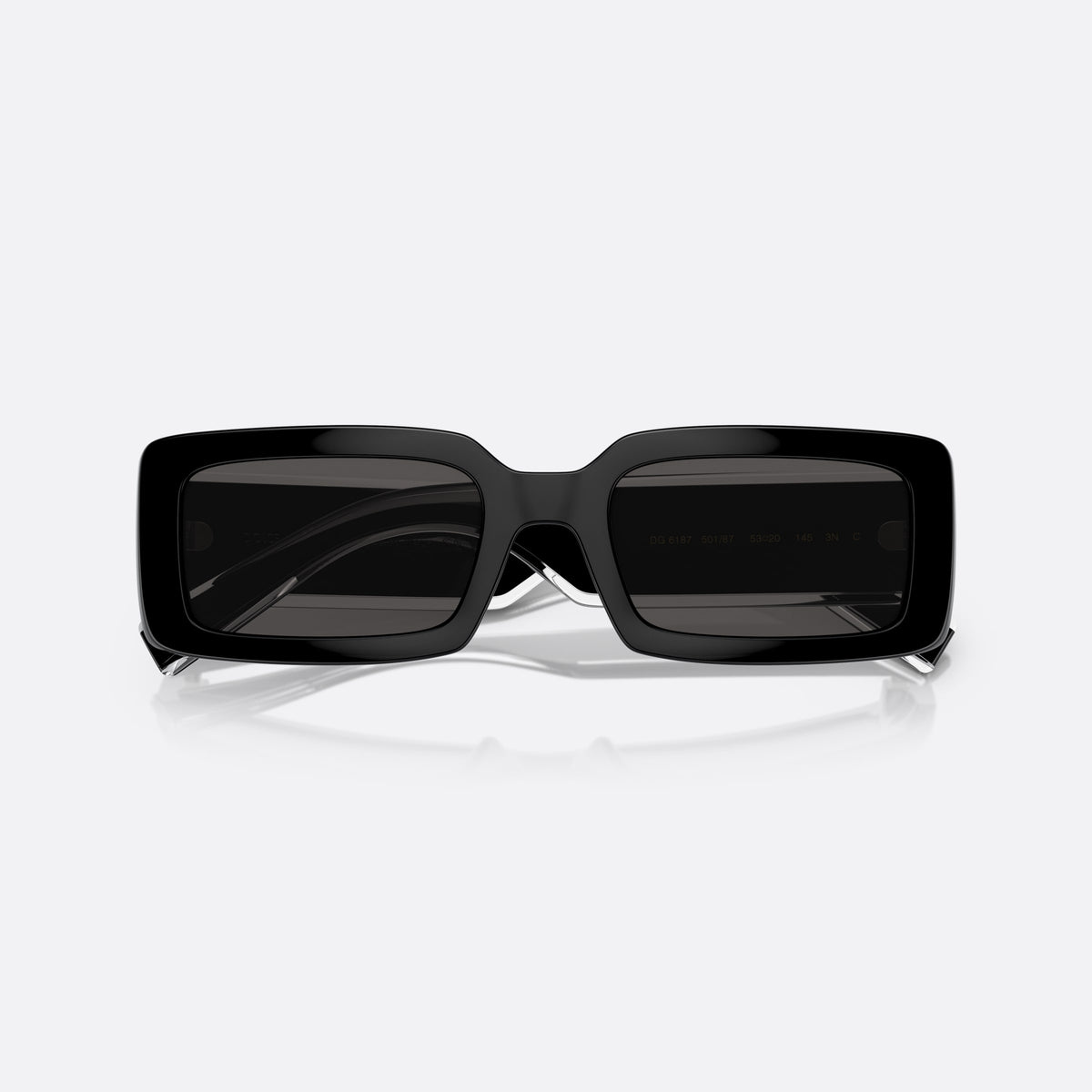 Dolce & Gabbana DG6187 501/87 sunglasses, black rectangle frame, unisex, plain integrated bridge, brand lettering on temples, folded