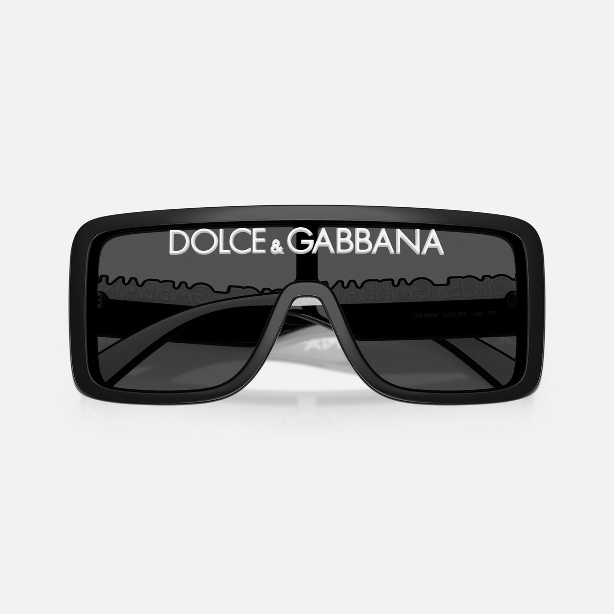 Dolce & Gabbana DG6204 L50187 sunglasses, black rectangle frame, unisex, integrated bridge on lens, brand lettering on the temples, folded