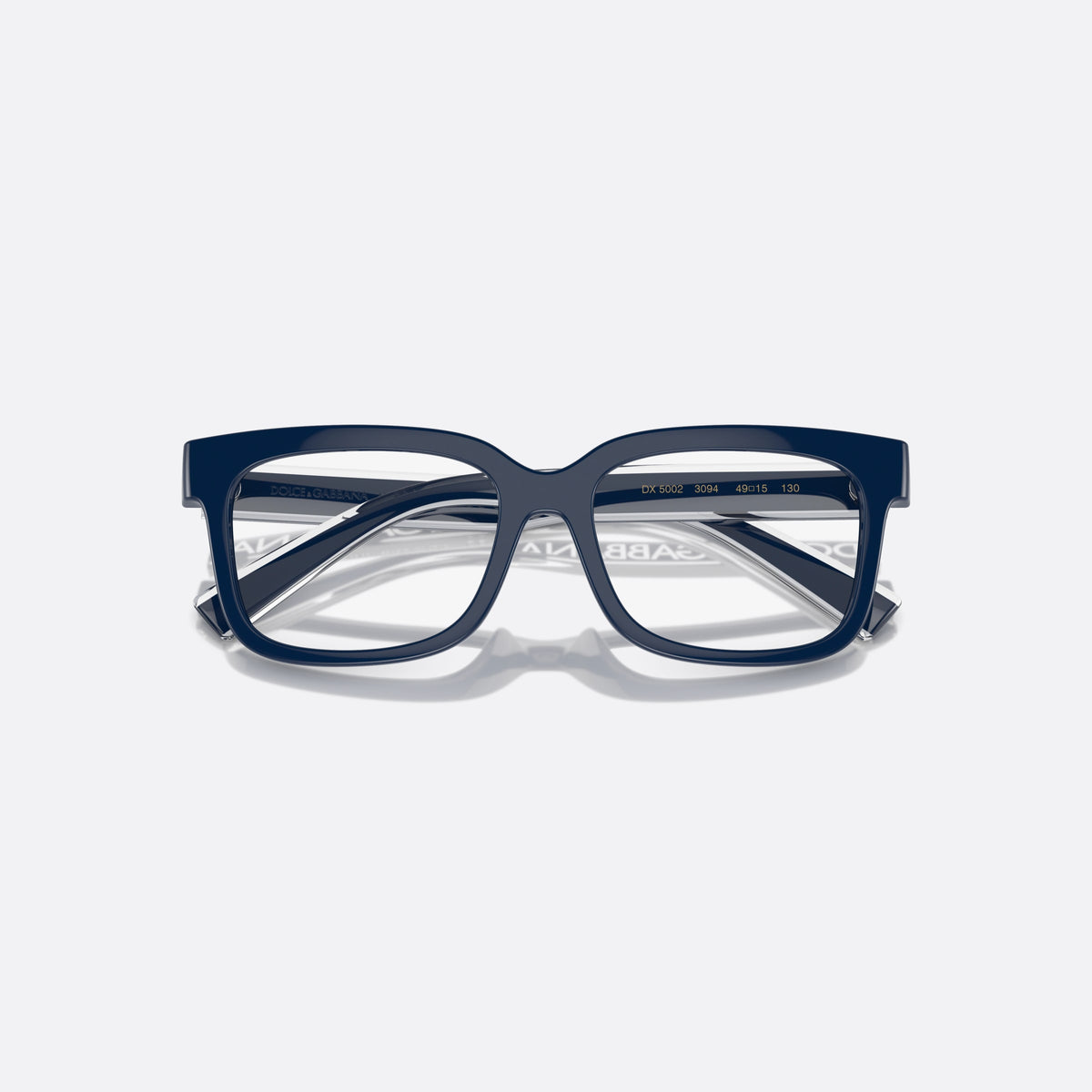Dolce & Gabbana DX5002 3094 eyeglasses, blue rectangle frame for kids, plain bridge, brand lettering on temples, full-rim frame, folded