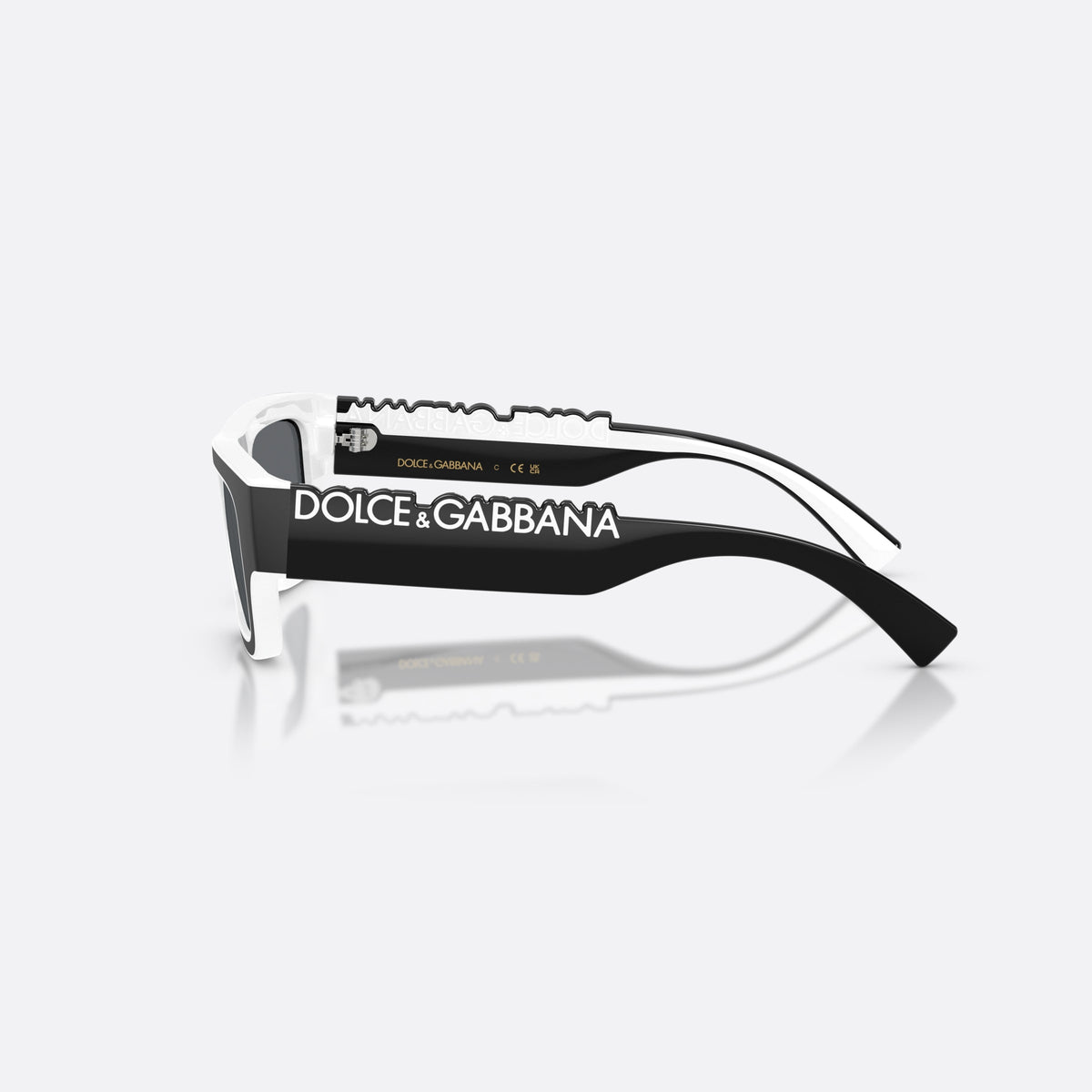 Dolce & Gabbana DX6011 34576G sunglasses, black rectangle frame for kids, plain bridge, brand lettering on temples, full-rim frame, side view