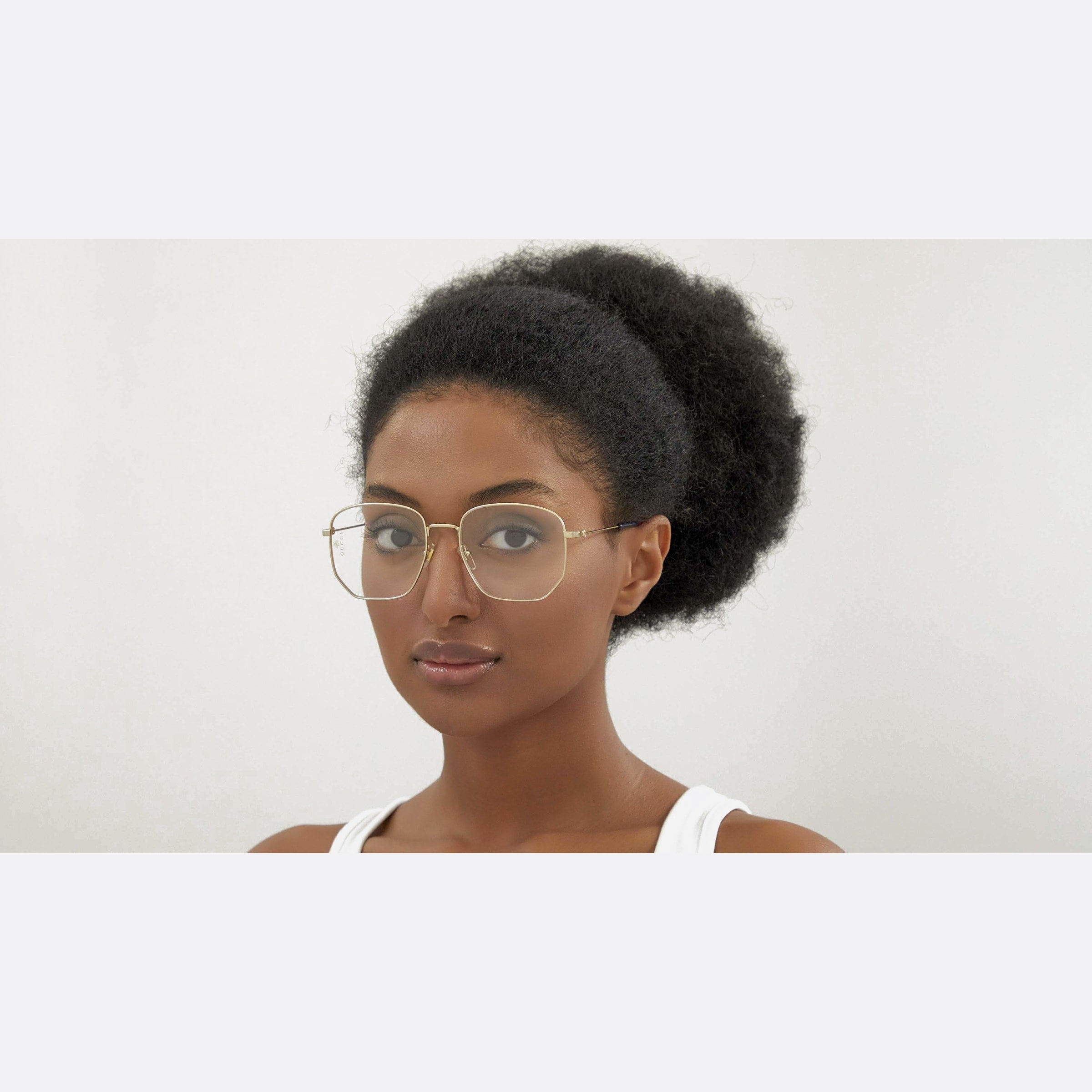 Gucci 56mm Gold Geometric Woman Eyeglasses - Lifestyle Shot