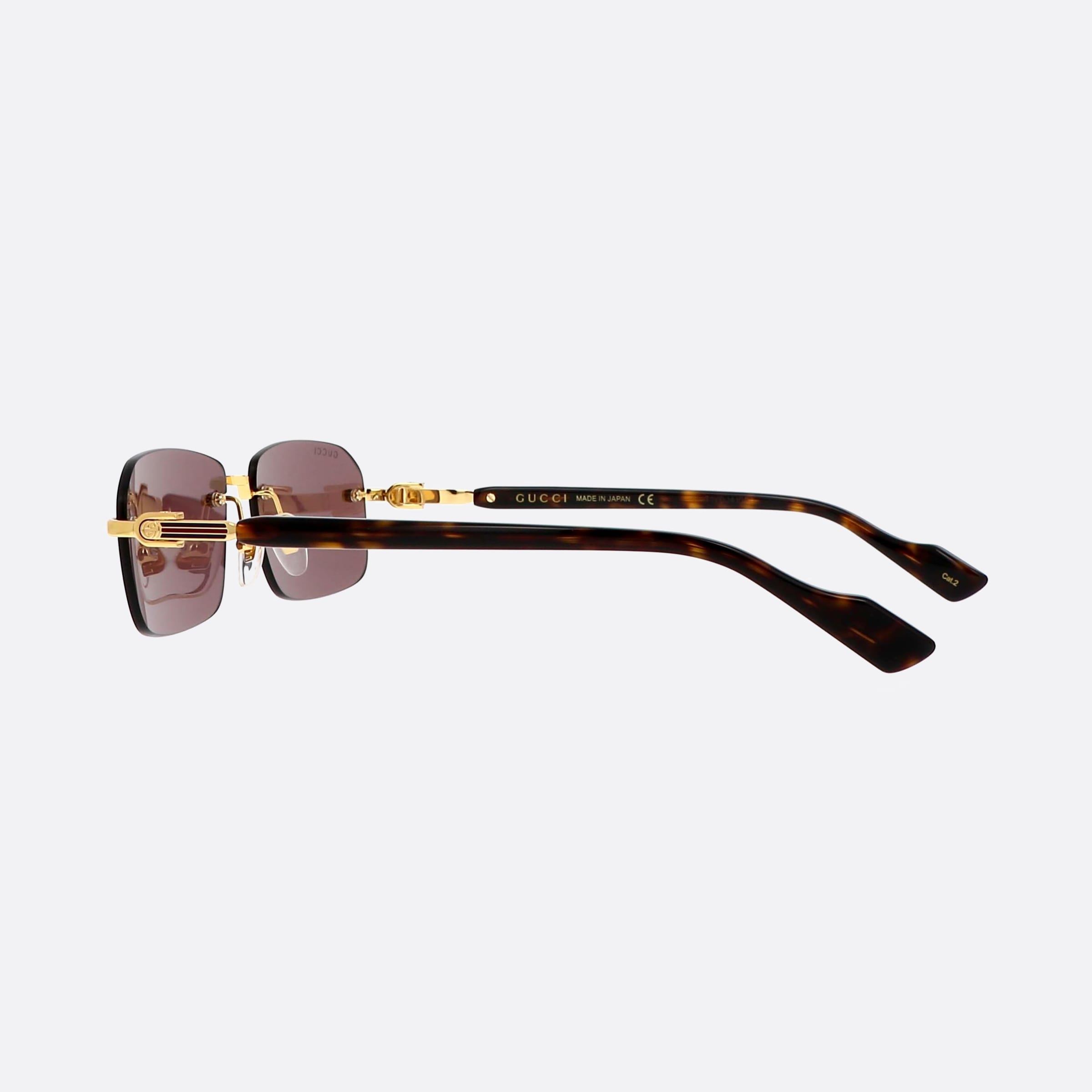 Gucci 56mm Gold Geometric Man Sunglasses - Detail View