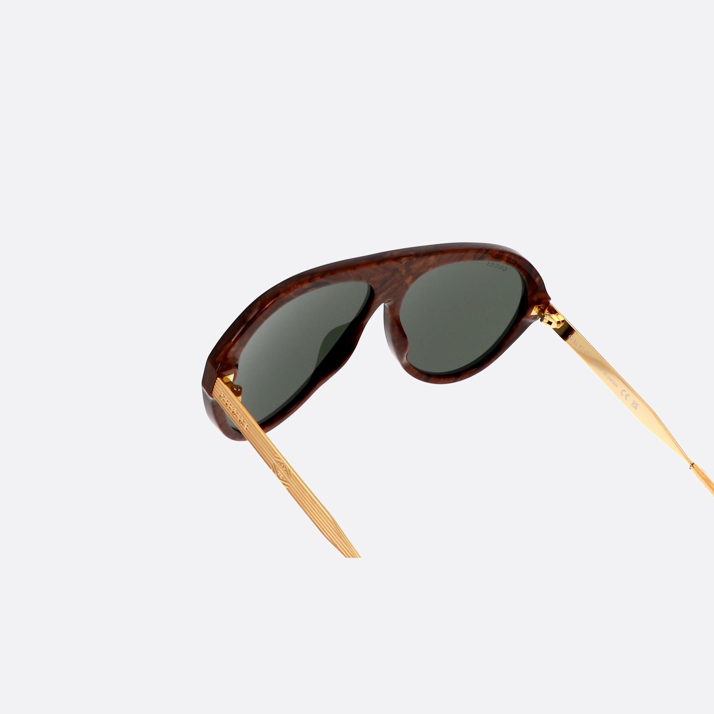 Gucci 61mm Lettering Gold Pilot Man Sunglasses - Lifestyle Shot