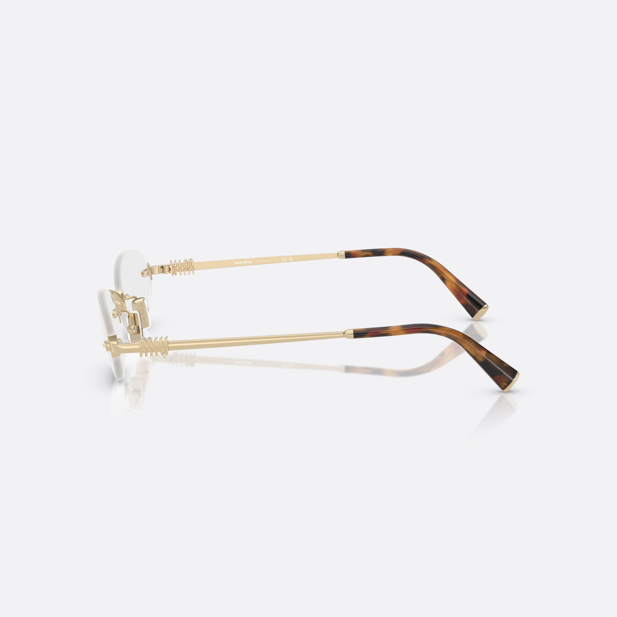 Miu Miu 0MU 53WV ZVN1O1 eyeglasses, gold oval frame for women, metal bridge with slim profile, metal hinges, side view