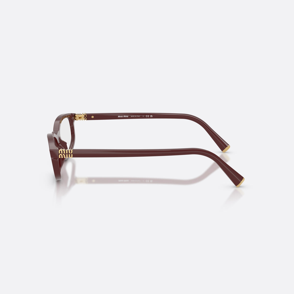 Miu Miu MU 01ZV 26L1O1 eyeglasses, pink oval frame for women, integrated plain bridge, brand lettering on temples, side view