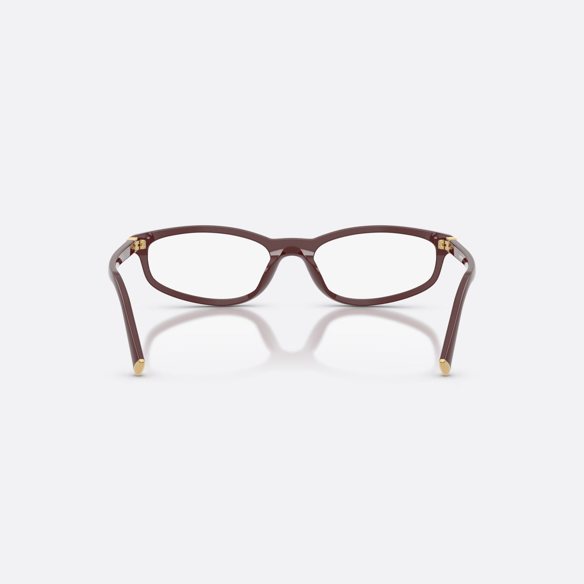 Miu Miu MU 01ZV 26L1O1 eyeglasses, pink oval frame for women, plain integrated bridge, brand lettering on temples, back view