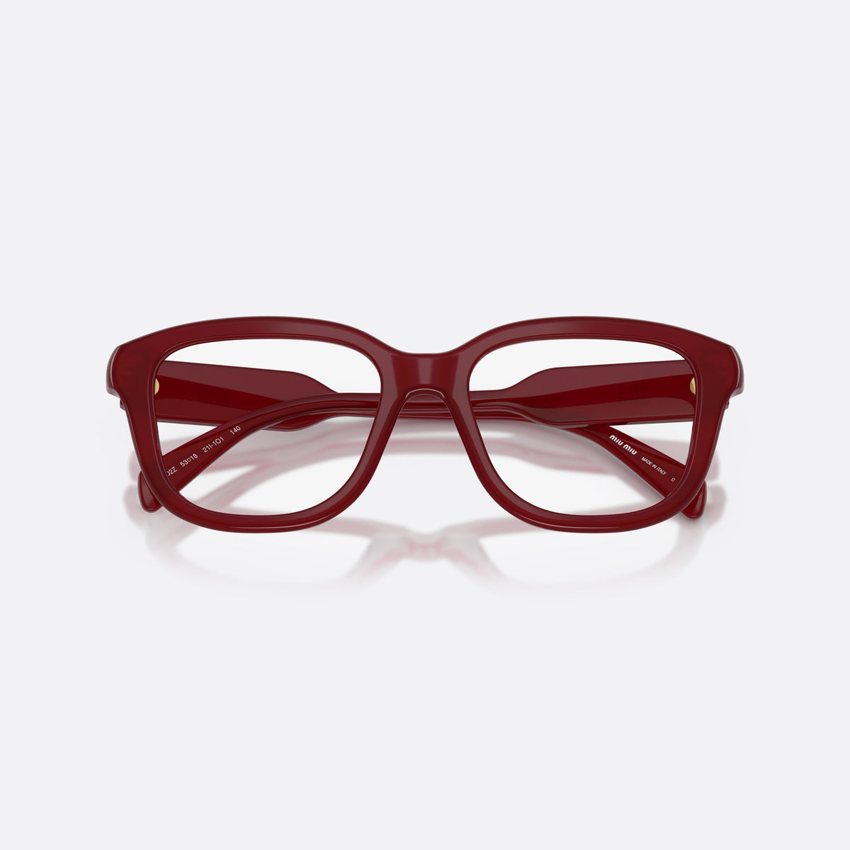 Miu Miu MU 02ZV 21I1O1 eyeglasses, red rectangle frame for women, plain bridge, brand lettering on temples, temple plaque, folded