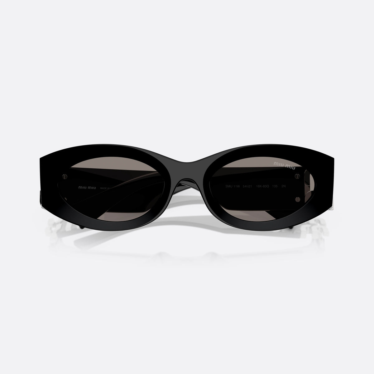 Ochelari de soare Miu Miu MU 11WS 16K80Q, ovali negru, pentru femei, punte simplă integrată, literele brandului pe brațe, cu brațele pliate