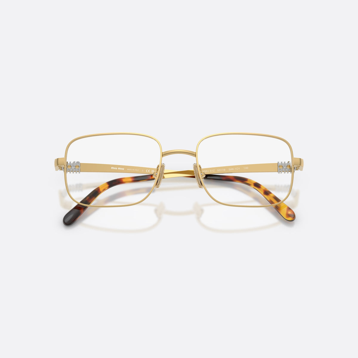 Miu Miu MU 51ZV 5AK1O1 eyeglasses, gold rectangle frame for women, plain metal bridge, brand lettering on temples, folded