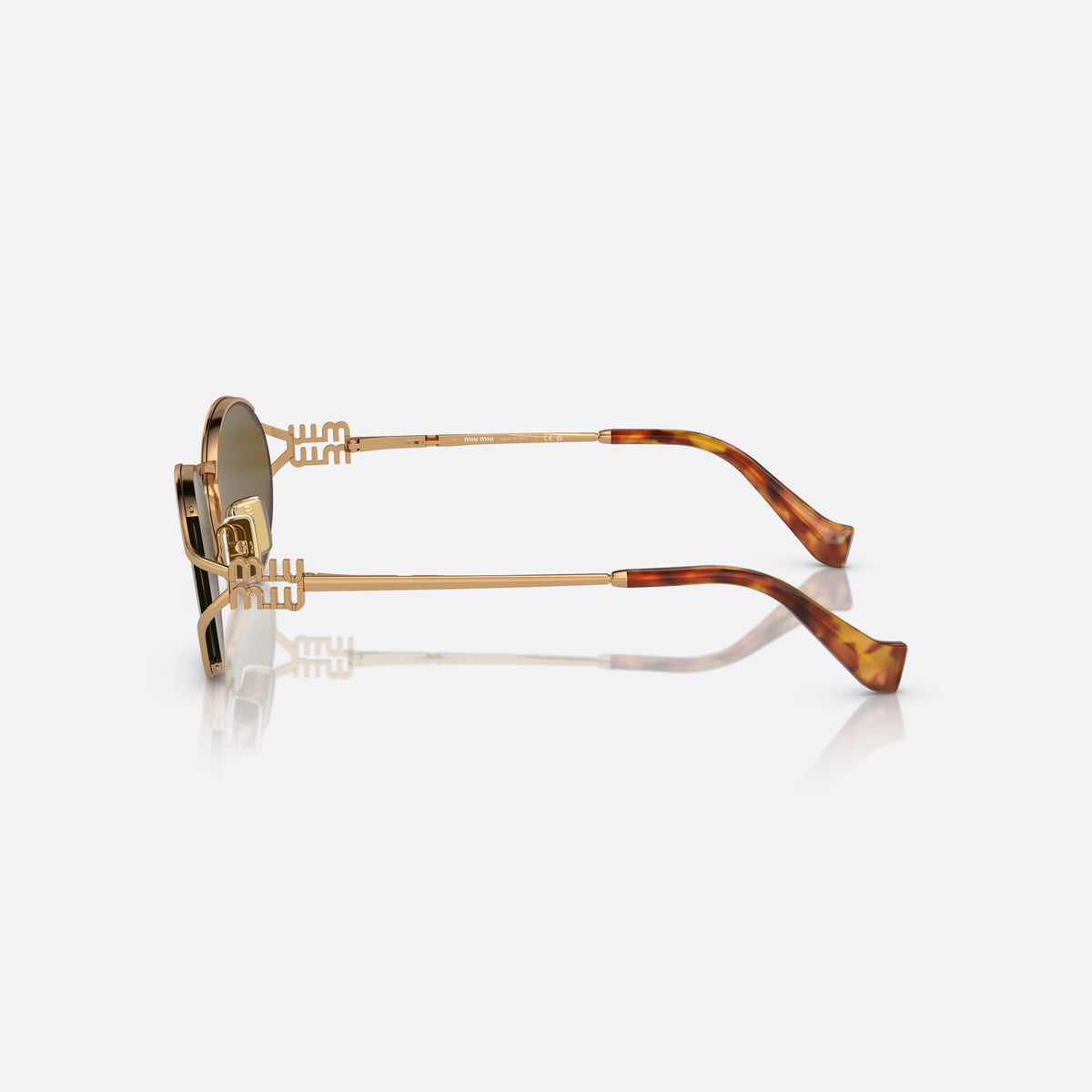 Miu Miu MU 52YS 7OE-01T sunglasses, gold oval frame for women, thin metal bridge, brand logo on temple, side view